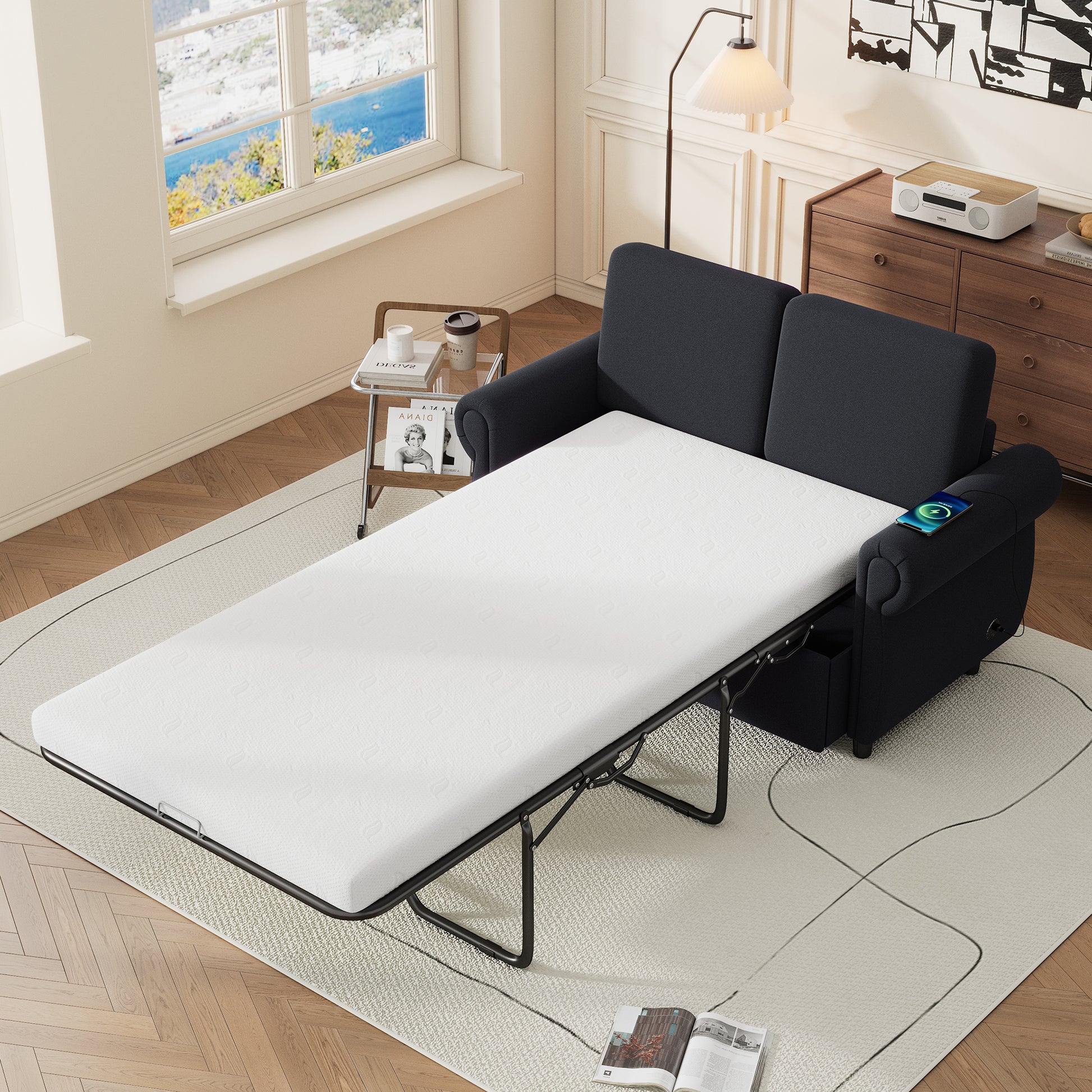 Dark grey fabric sofa bed unfolded with white mattress integrated wireless charger