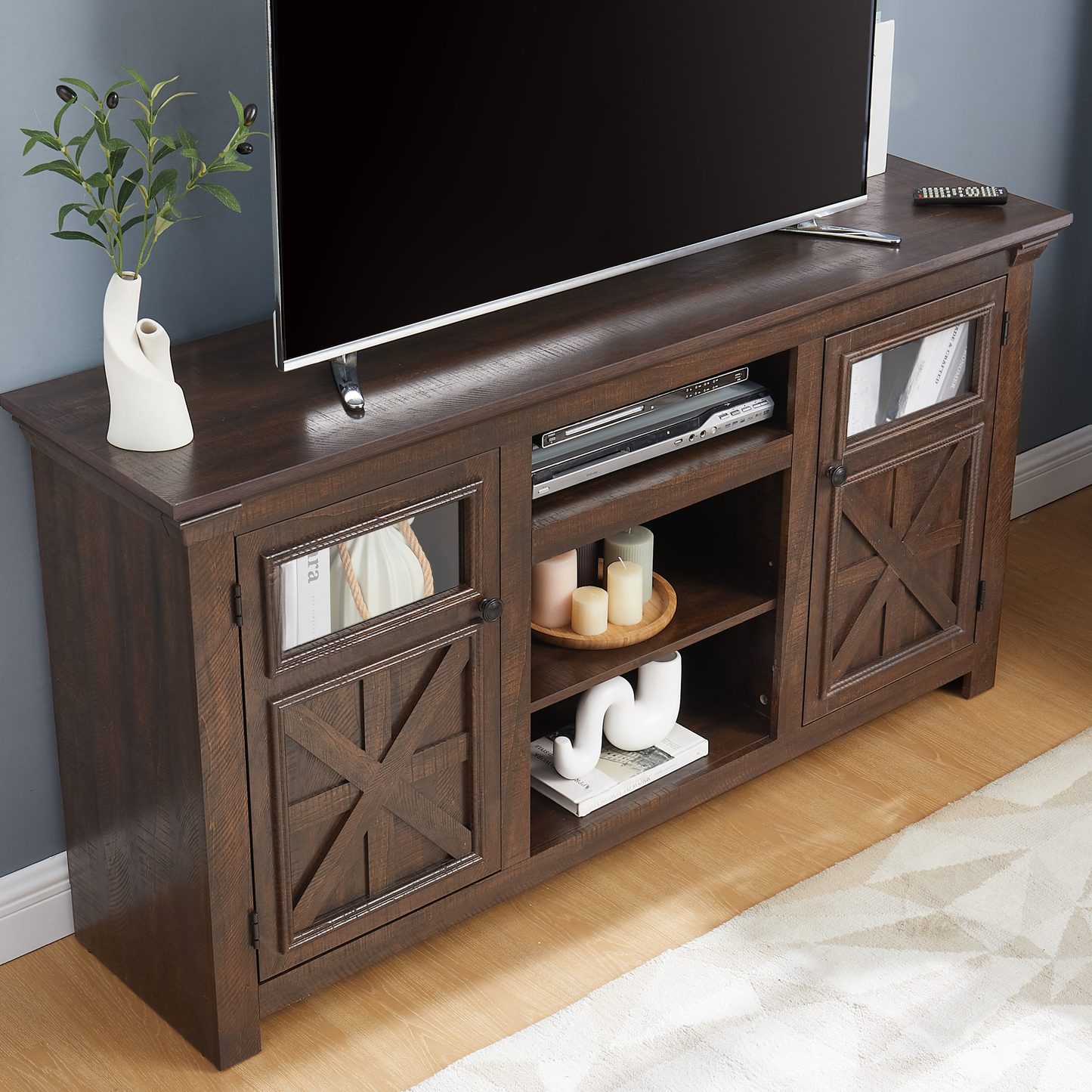 Dark brown farmhouse TV stand with glasspaneled doors and Xdesign accents