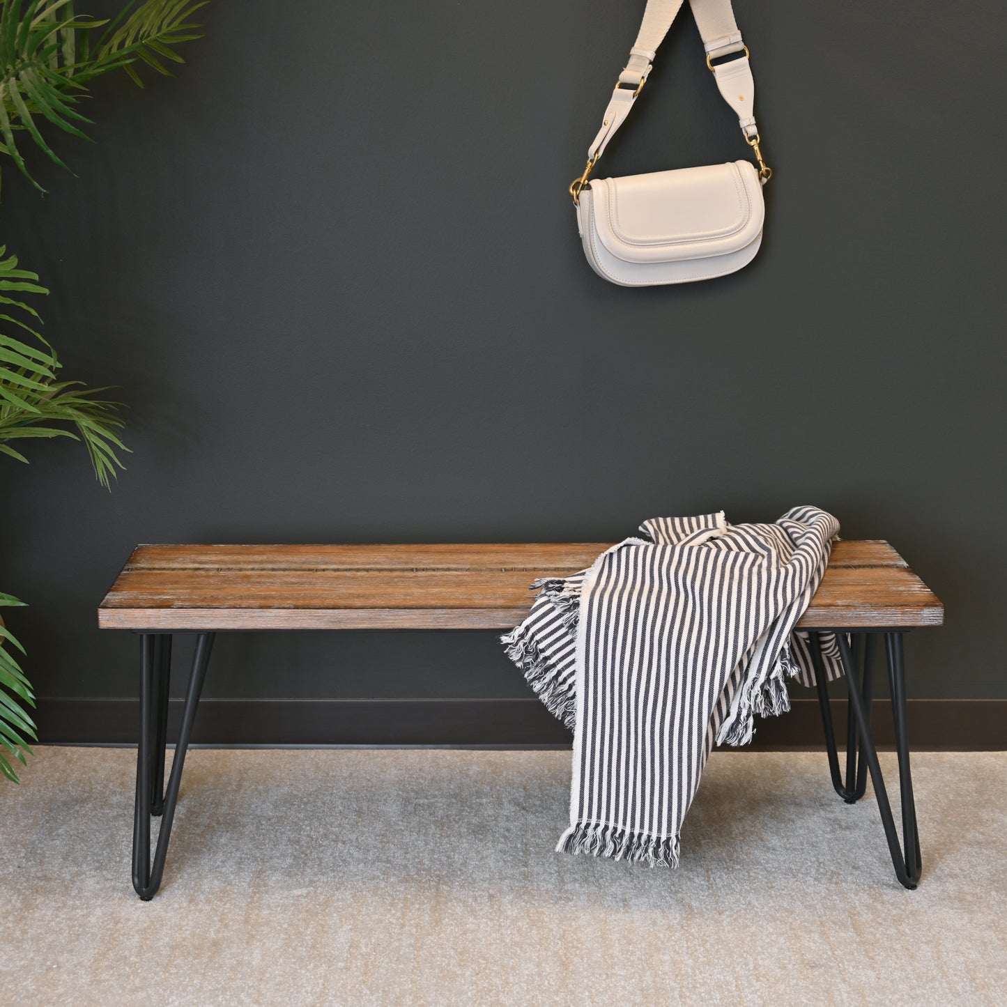 Rustic wooden entryway bench with black hairpin legs