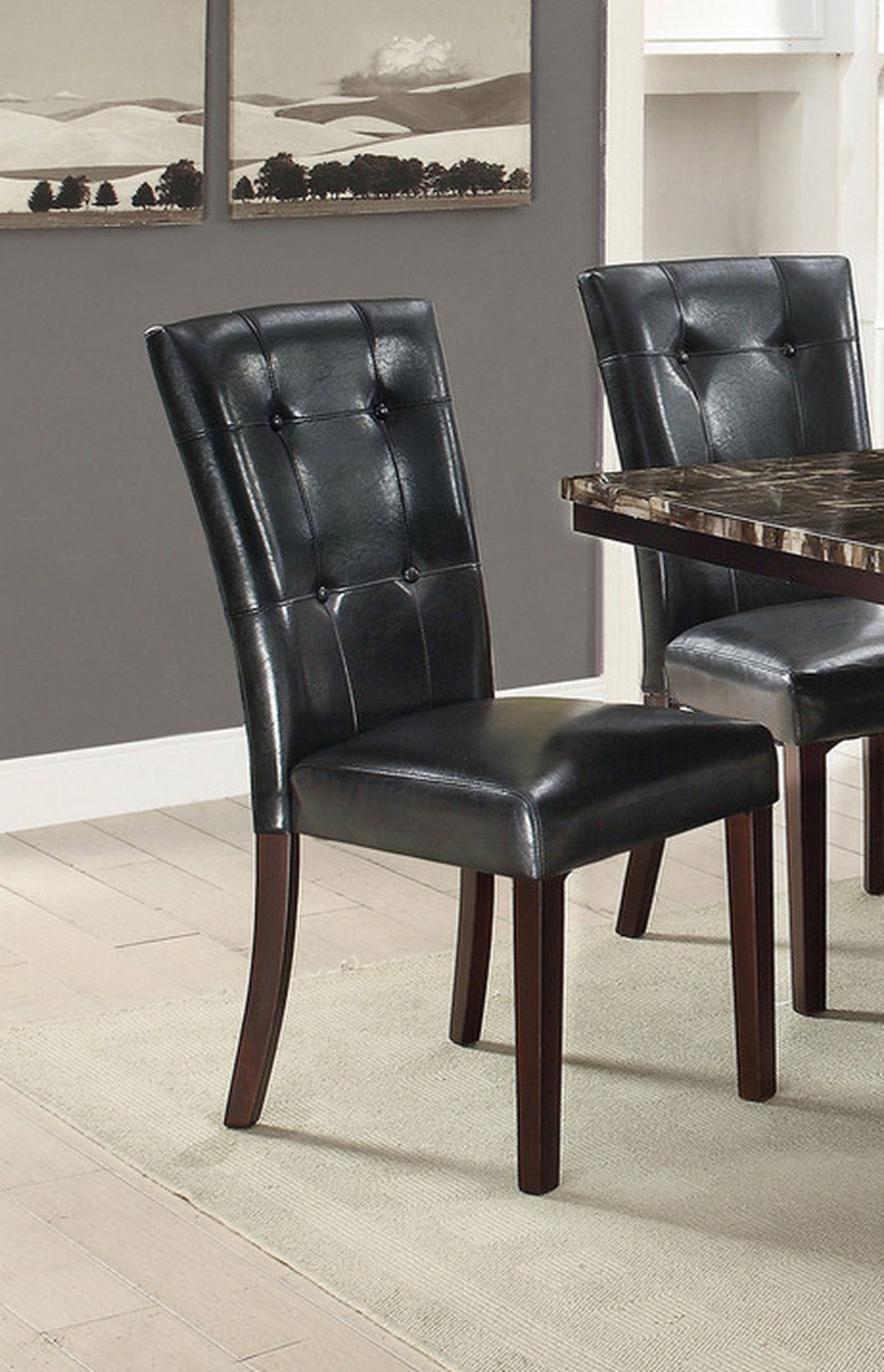 Black tufted faux leather dining chair with dark wood legs