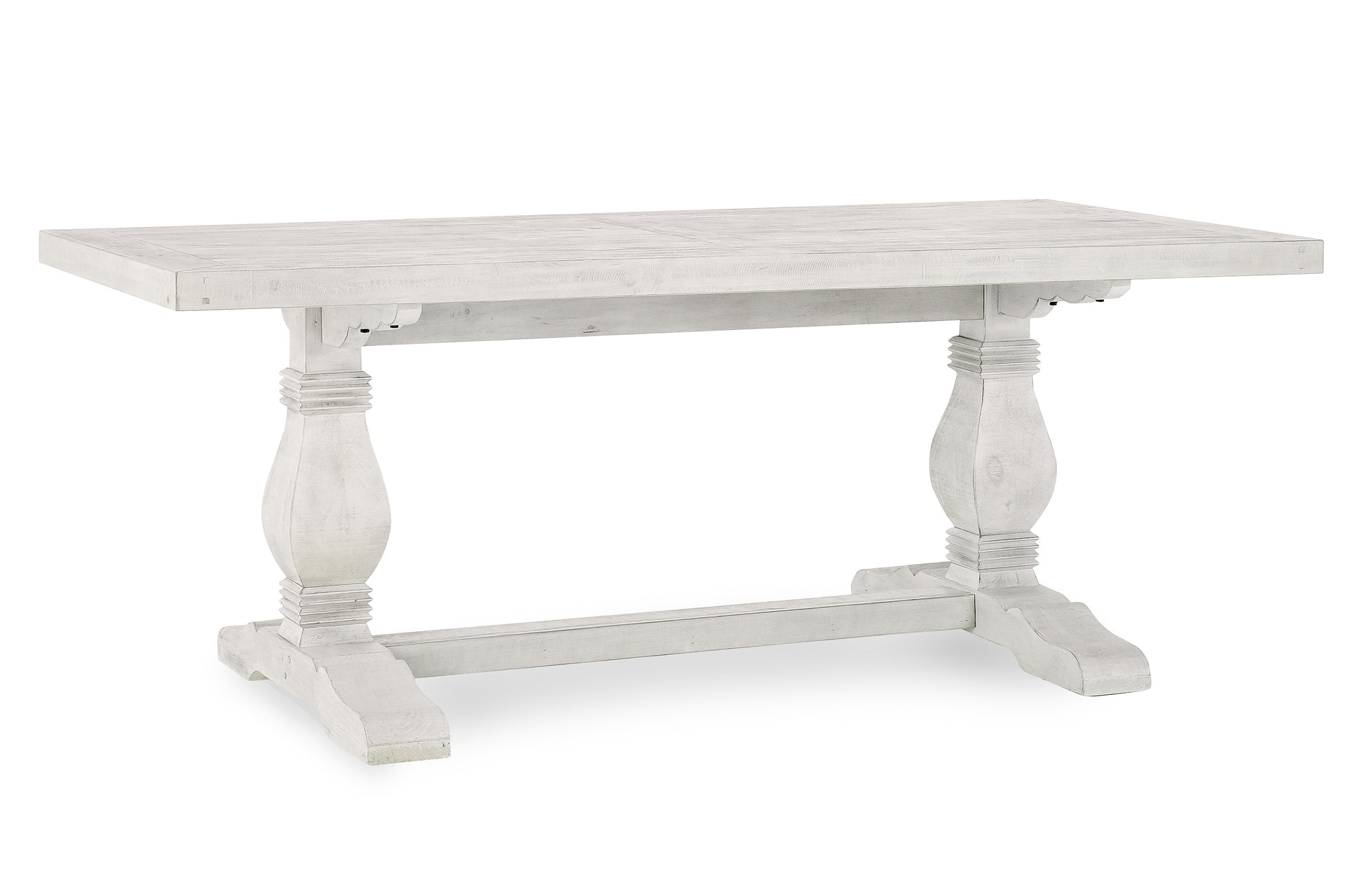 Distressed white wooden dining table with trestle base perfect for farmhouse kitchens