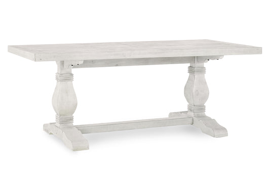 Distressed white wooden dining table with trestle base perfect for farmhouse kitchens