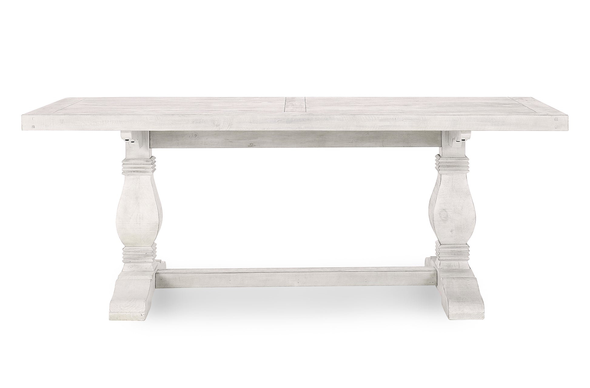 Distressed white farmhouse dining table with pedestal legs and subtle wood grain detail