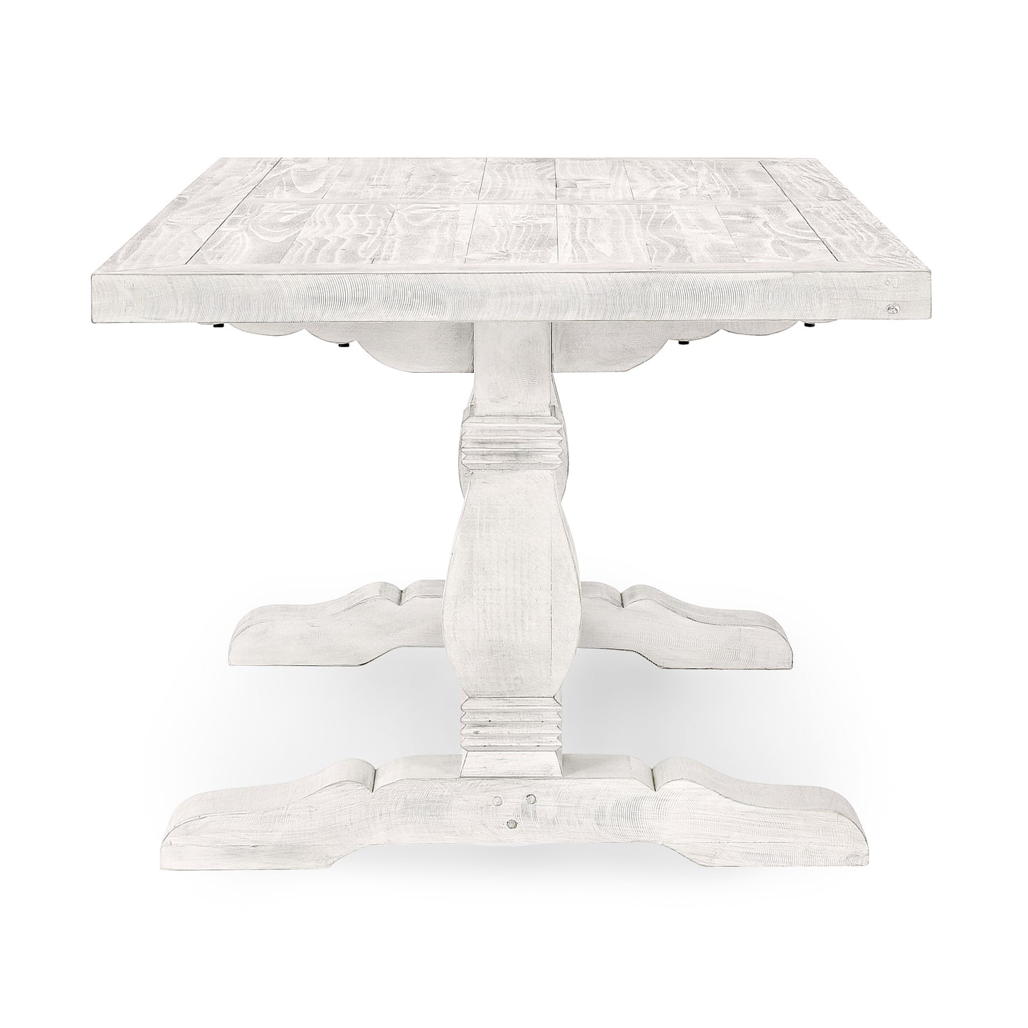 Distressed white wood dining table with a sturdy pedestal base and planked top