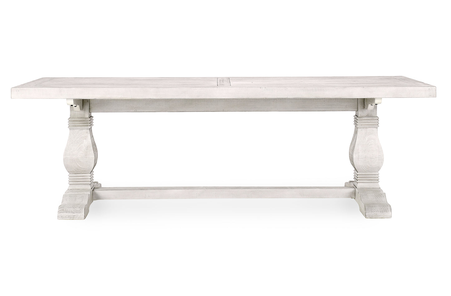 Distressed white wood dining table with pedestal legs perfect for farmhouse style dining
