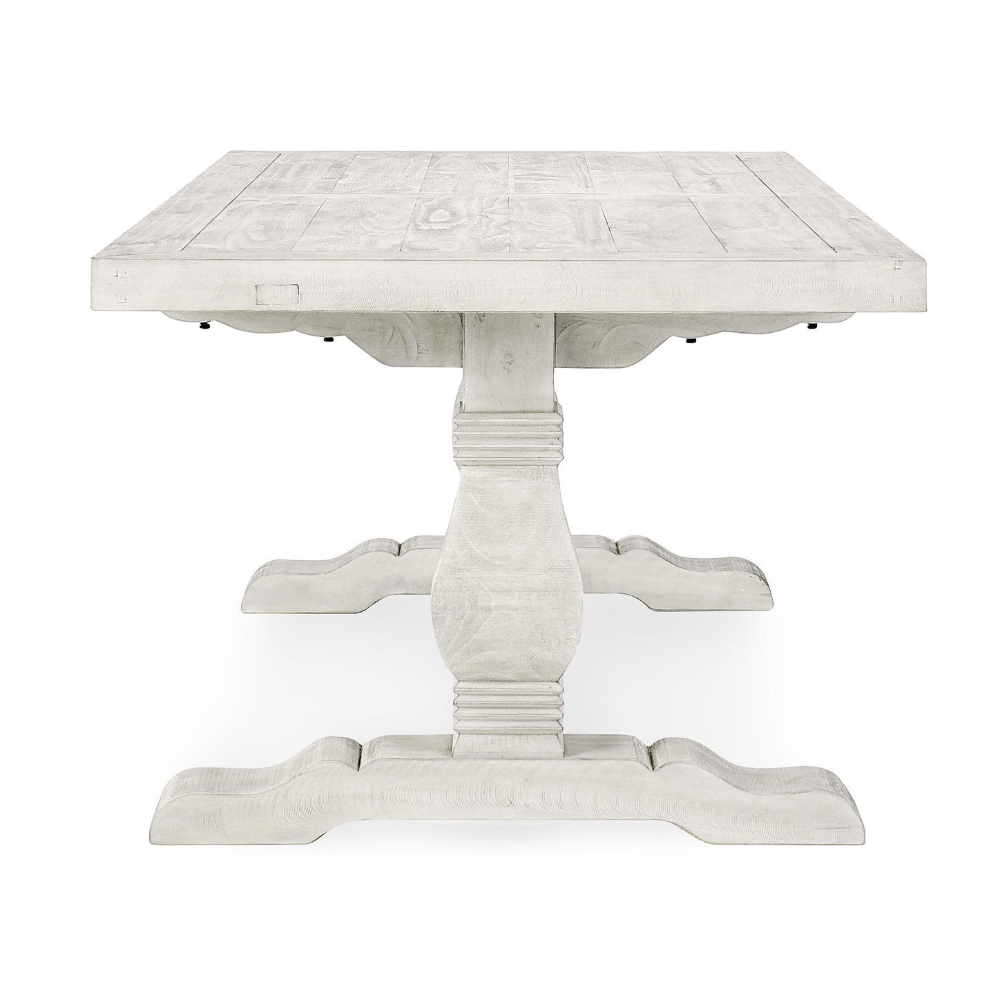 White distressed wood pedestal dining table with plank top