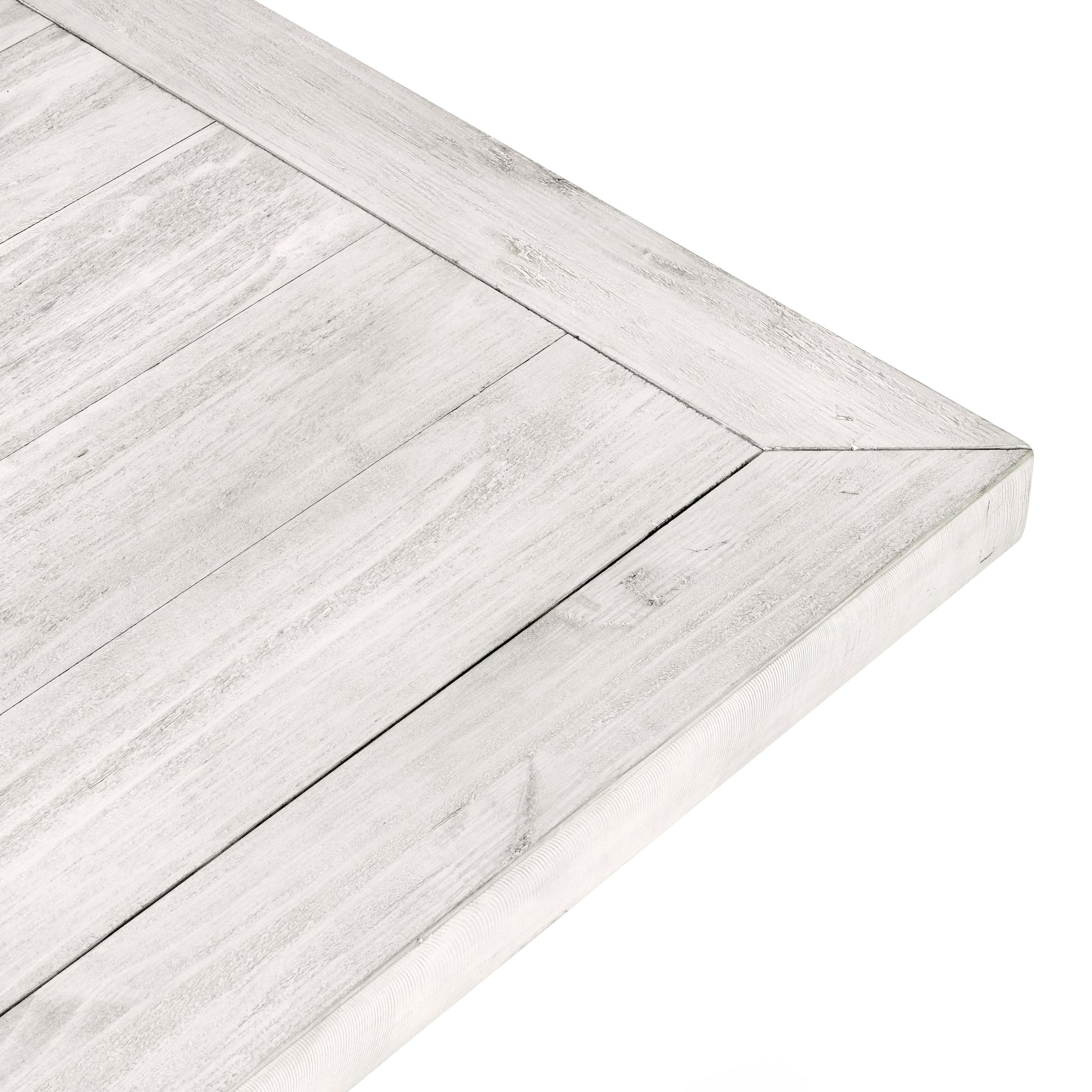 Distressed white wood tabletop with plank construction perfect for rustic dining