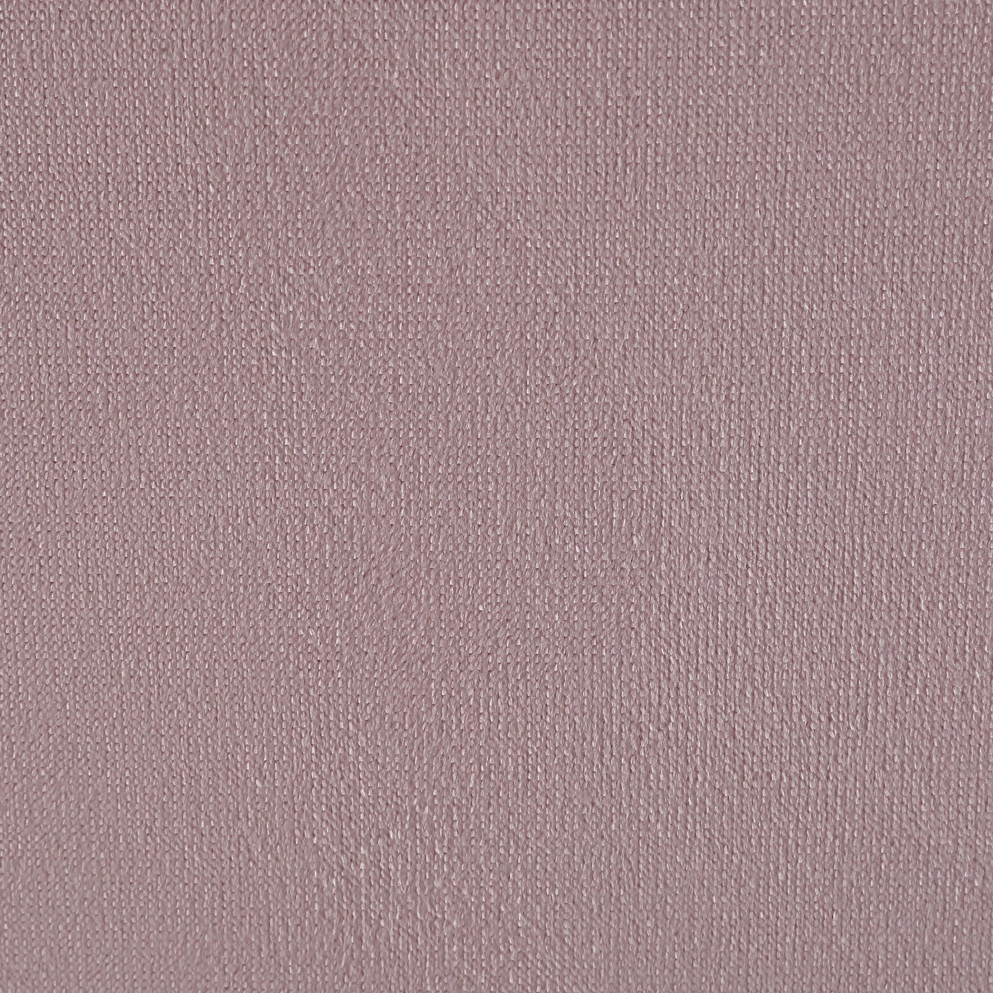 Closeup of textured blush pink linen fabric ideal for upholstery projects