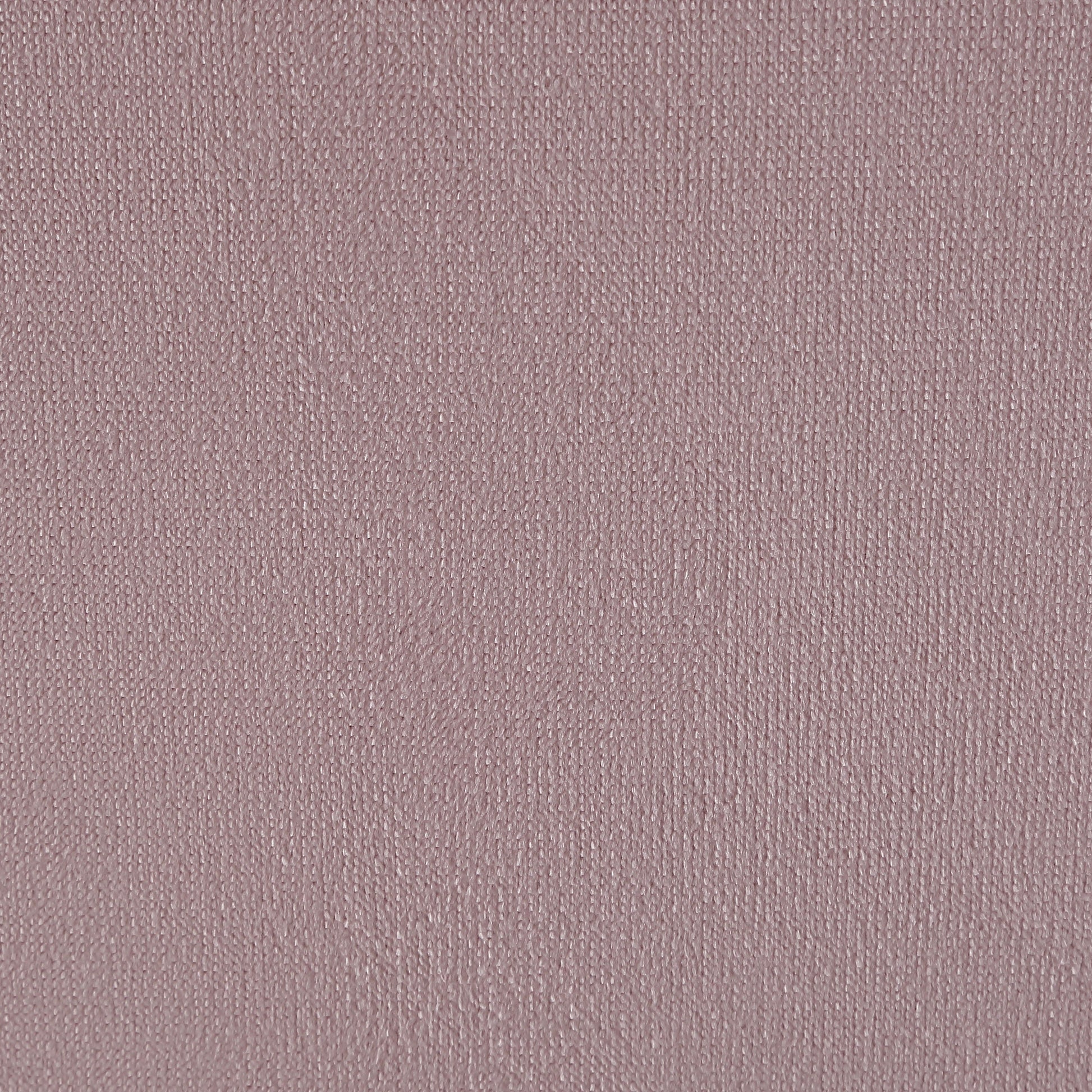 Closeup of textured blush pink linen fabric ideal for upholstery projects