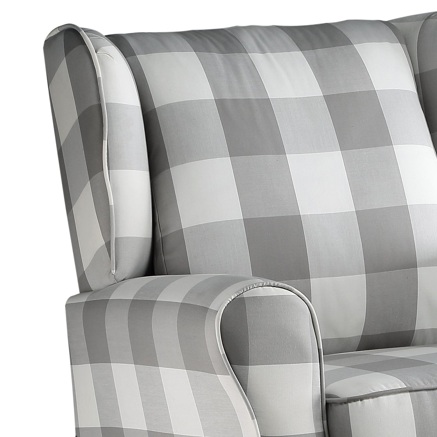 Gray buffalo check wingback chair arm detail with piped trim