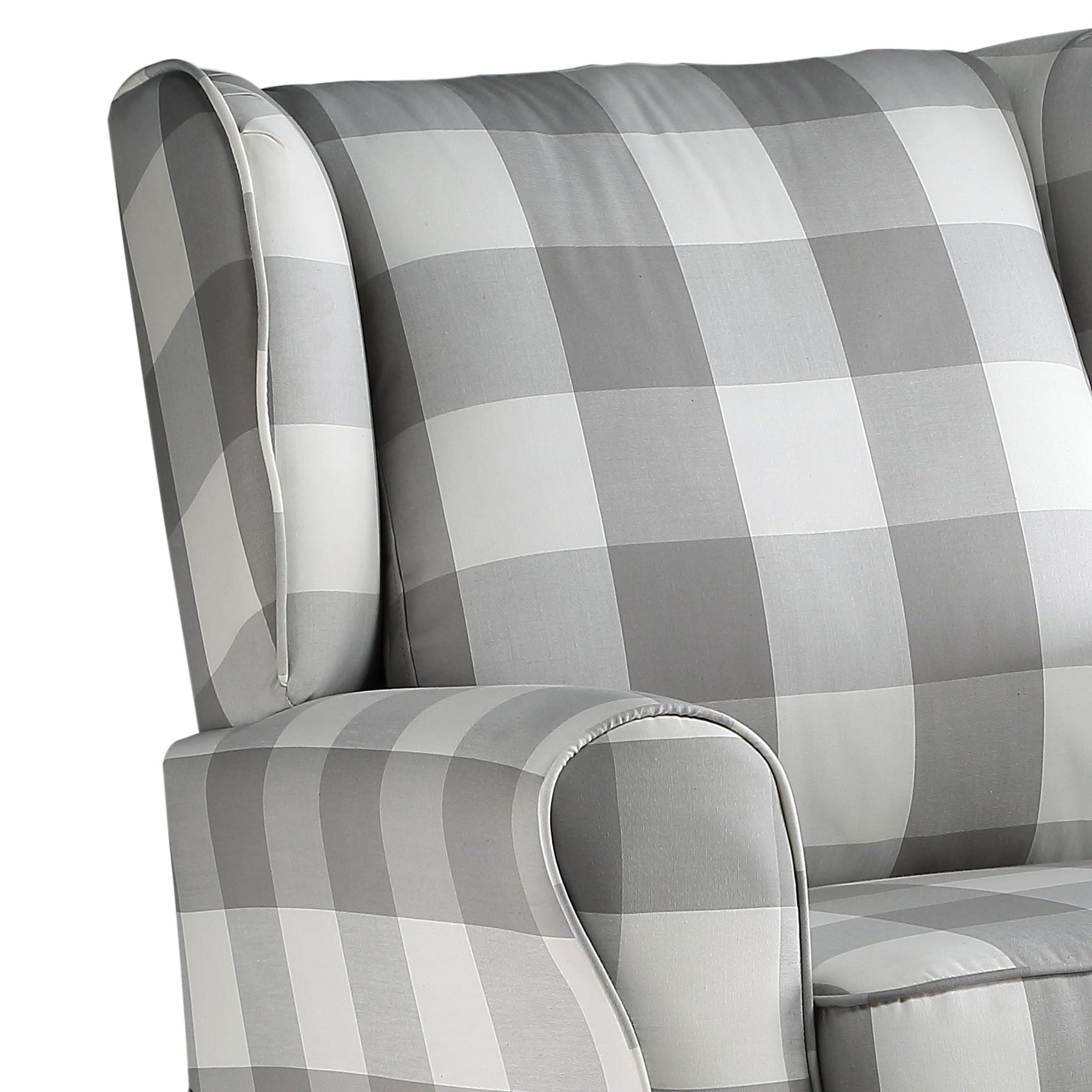 Gray buffalo check wingback chair arm detail with piped trim