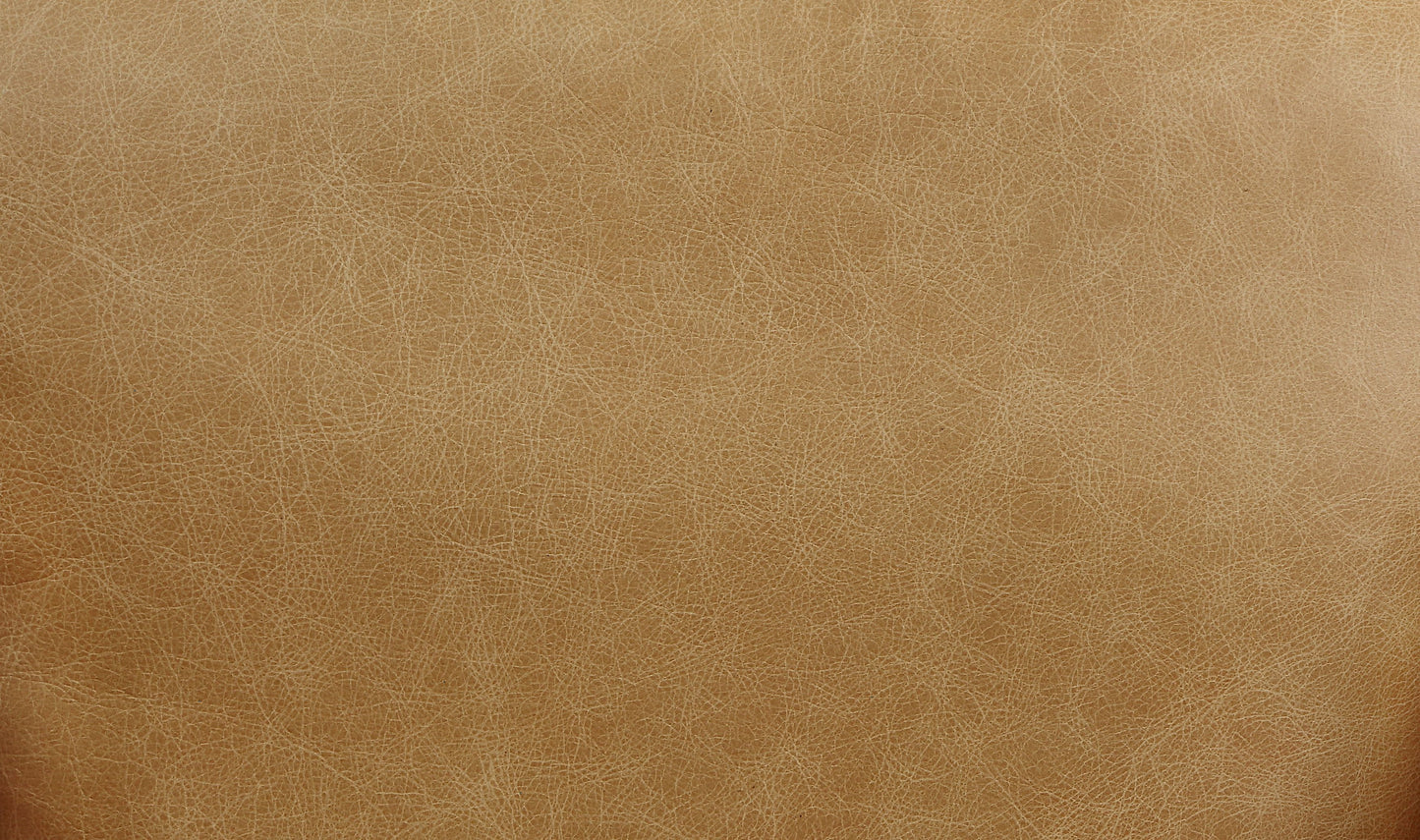 Tan distressed faux leather upholstery fabric with a subtle texture