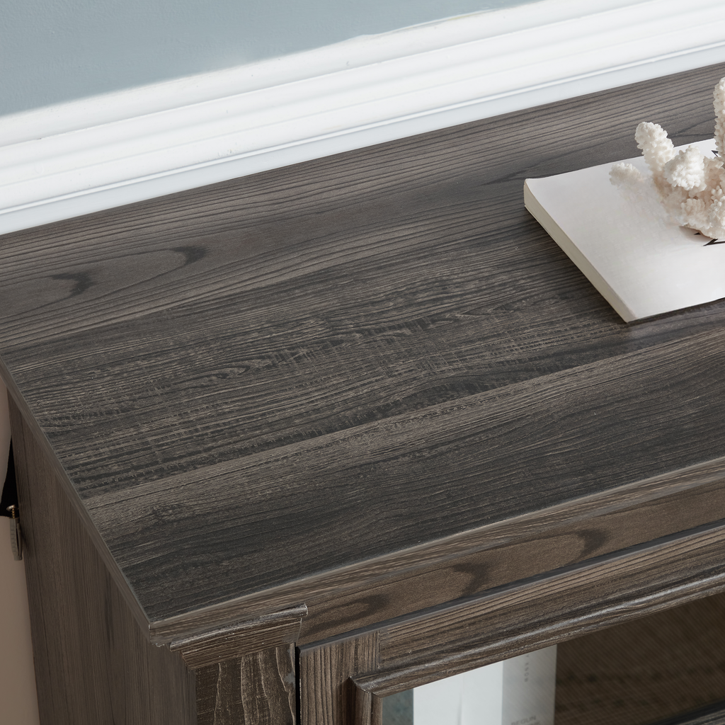 Dark gray wood veneer dresser top with natural grain texture and white trim