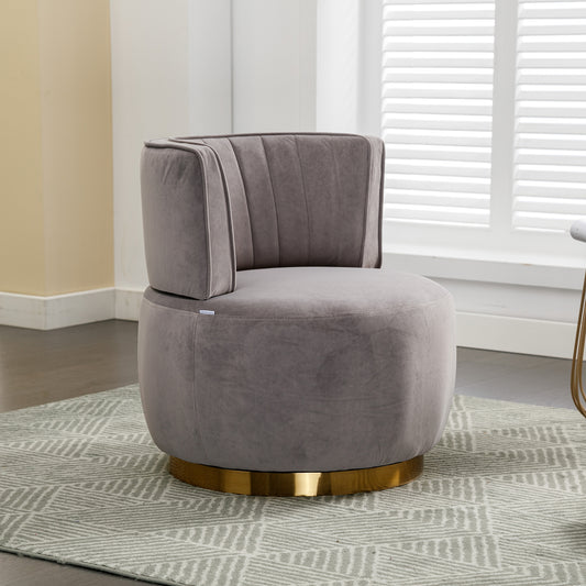 Gray velvet accent chair with plush cushioning and a gold swivel base