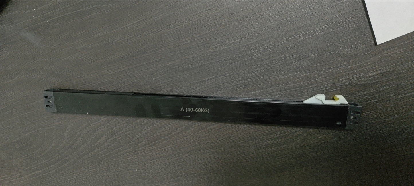 Black cabinet drawer slide with A KG label