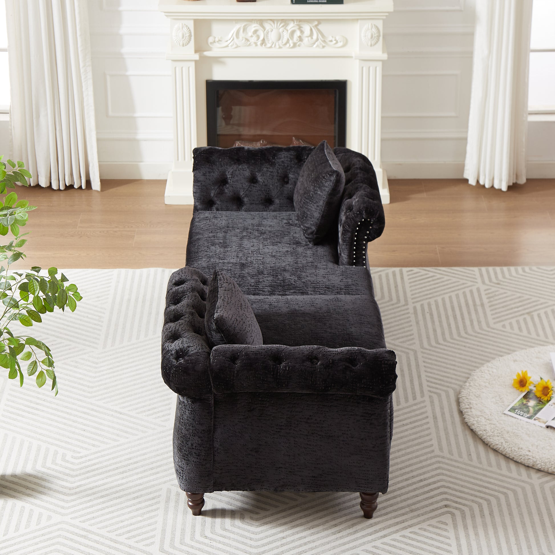 Chesterfield chaise lounge in dark gray velvet with tufted accents and studded armrest
