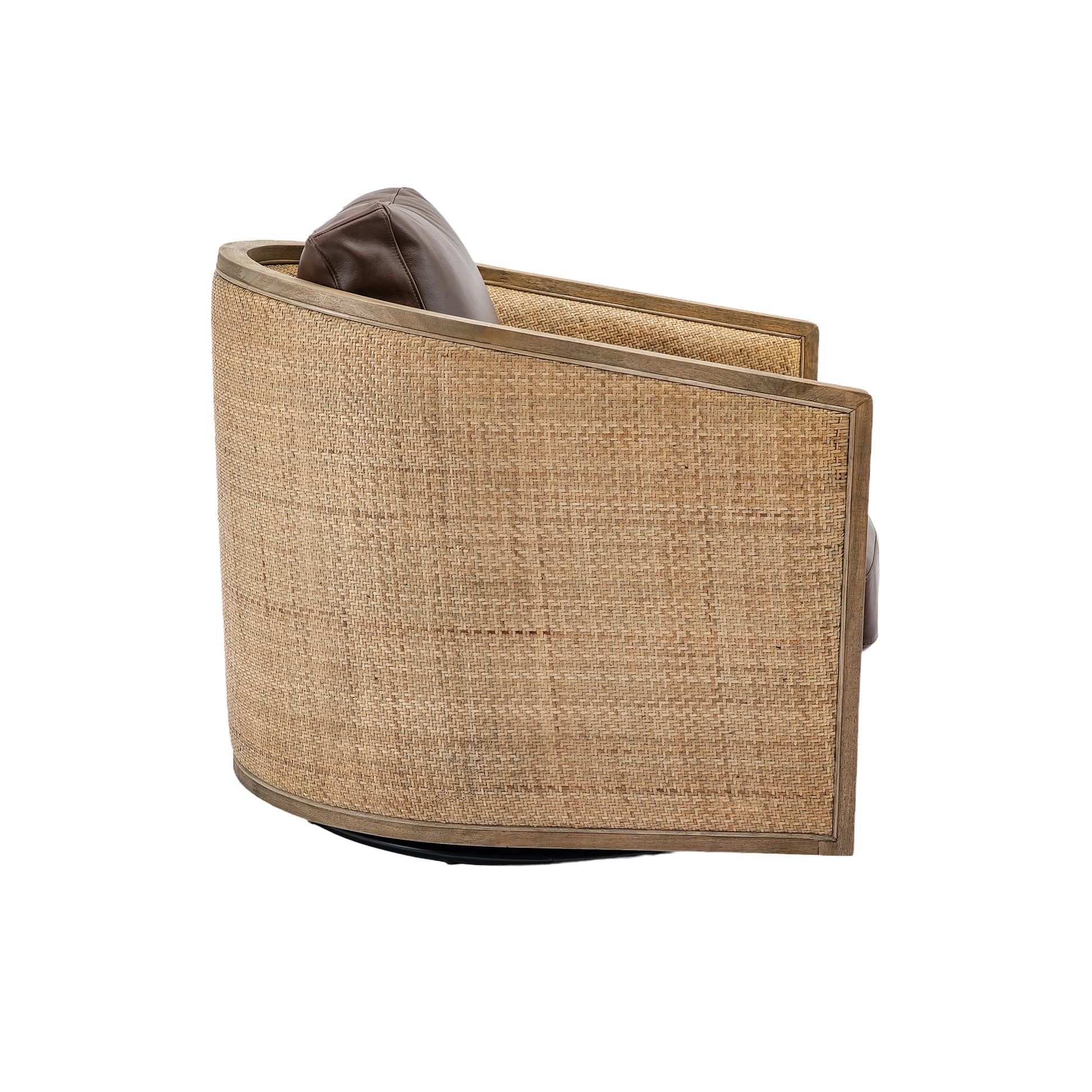 Swivel armchair with woven rattan base and brown leather cushion