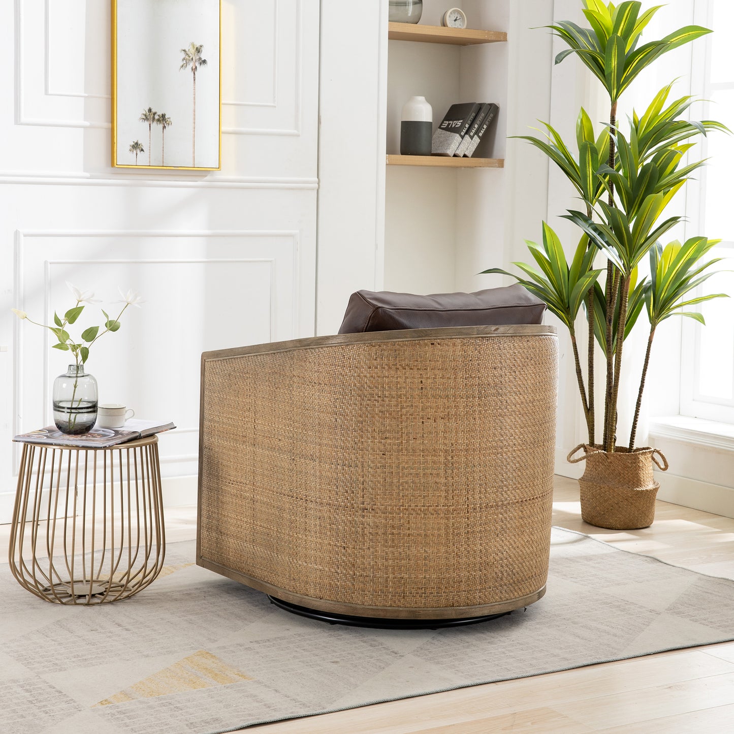 Curved rattan armchair with a dark brown leather cushion and natural wood trim