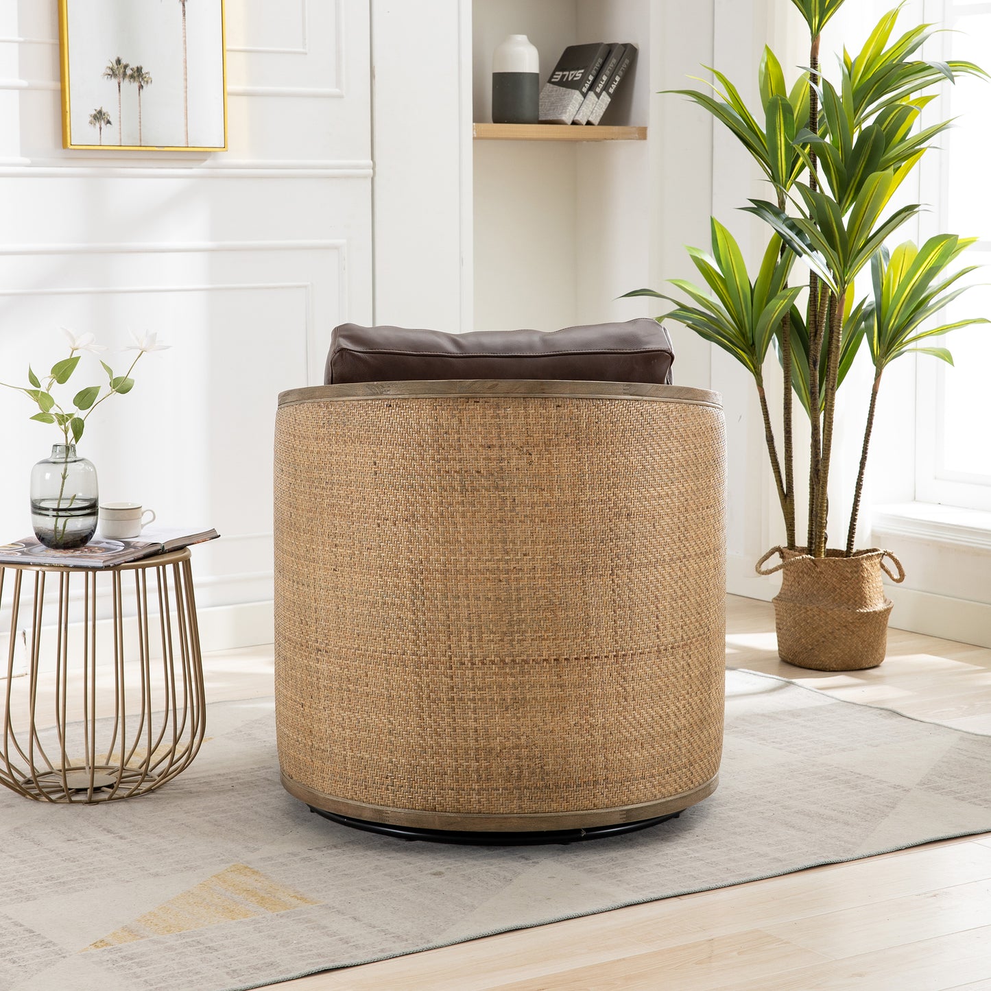 Woven rattan accent chair with brown leather cushion and wooden trim perfect for living rooms