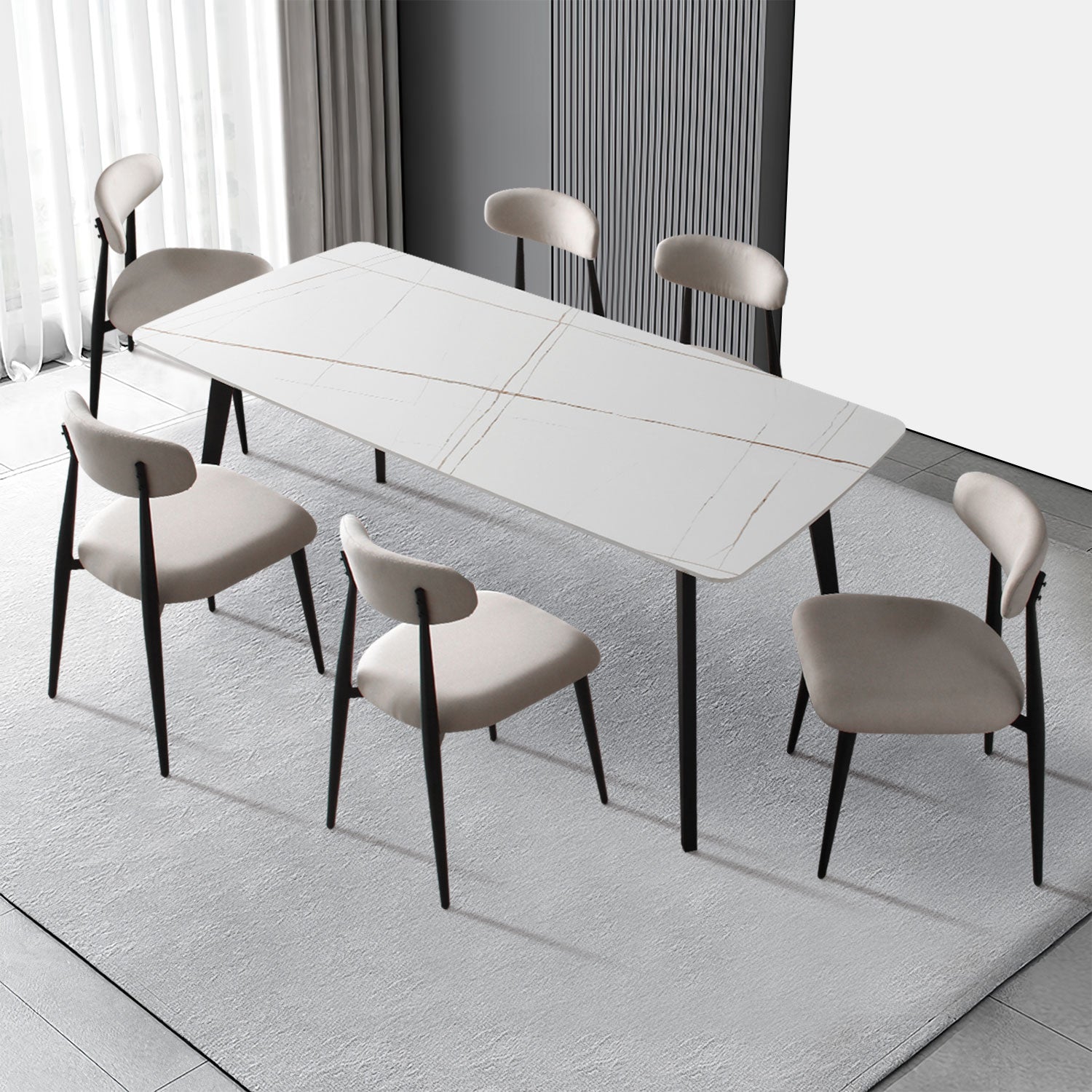 Modern white ceramic dining table with gold veining and grey upholstered chairs