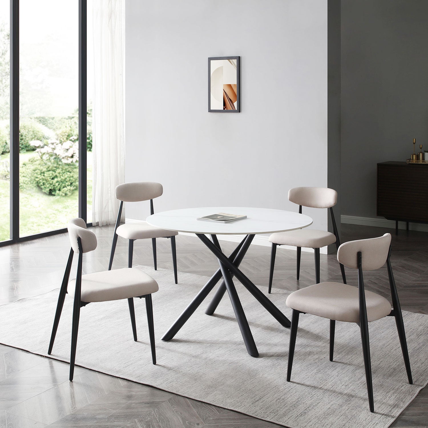 Modern dining set white round marble top table with black pedestal base and four beige upholstered chairs
