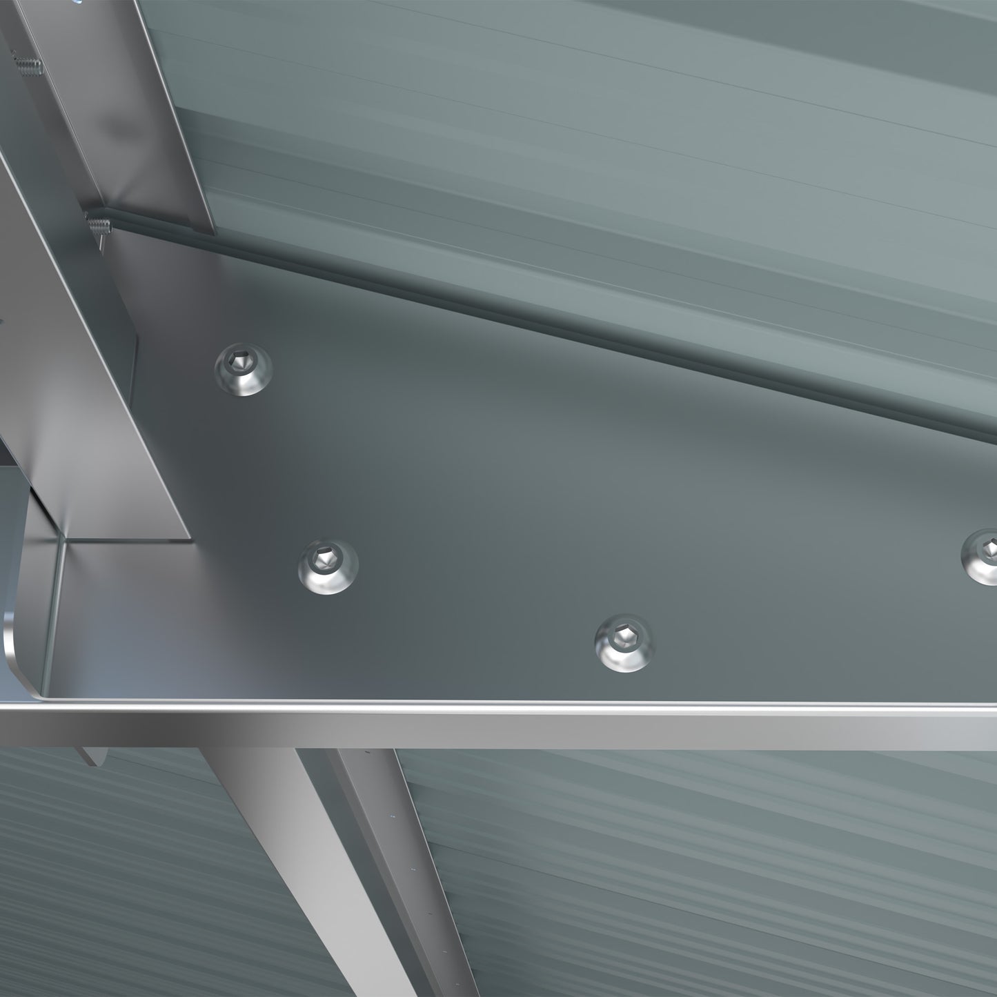 Closeup of silver metal roofing screws securing a corrugated metal panel for building construction