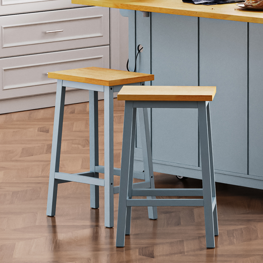 Two light blue bar stools with natural wood seats perfect for kitchen islands