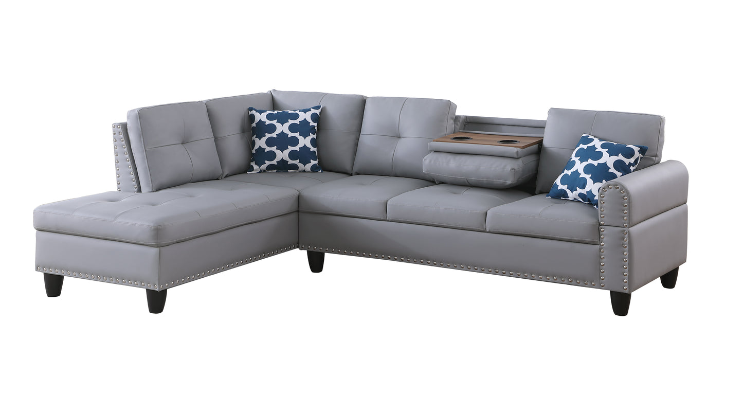 Gray faux leather sectional sofa with decorative nailhead trim and builtin cup holders
