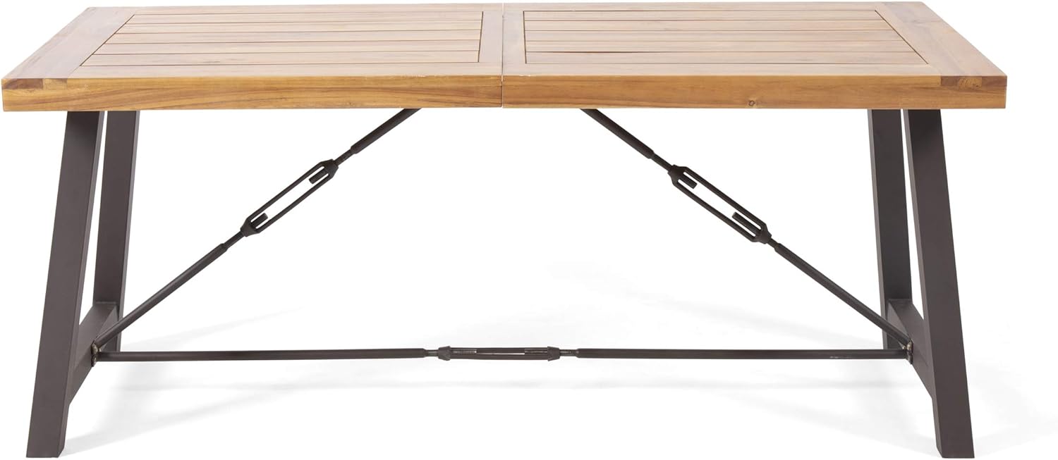 Teak slatted top dining table with dark metal legs and industrial crossbracing