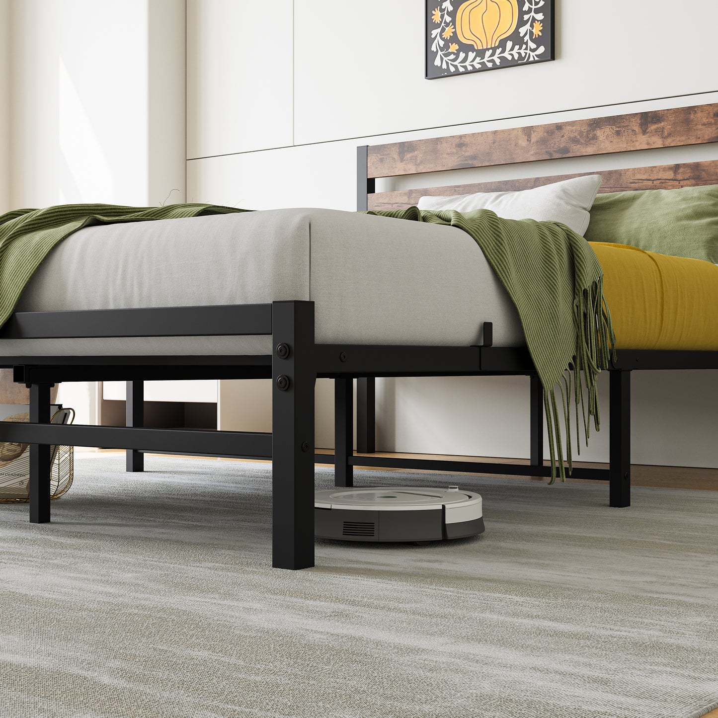 Modern black metal bed frame with rustic wood headboard and green throw