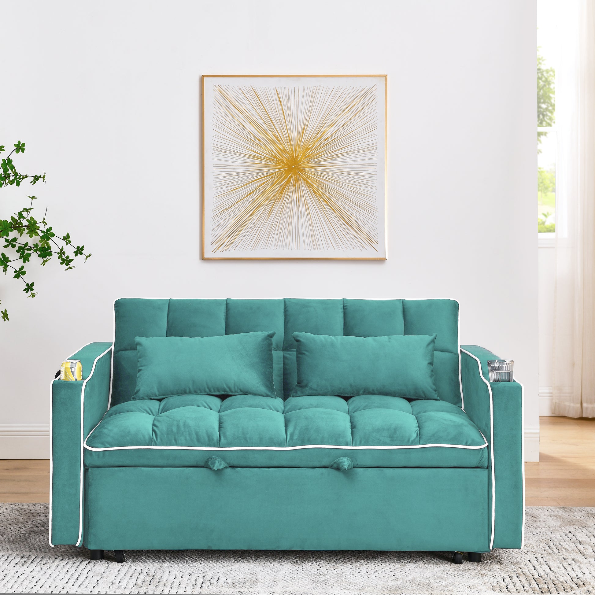Teal velvet sofa bed with tufted cushions and white piping perfect for small spaces