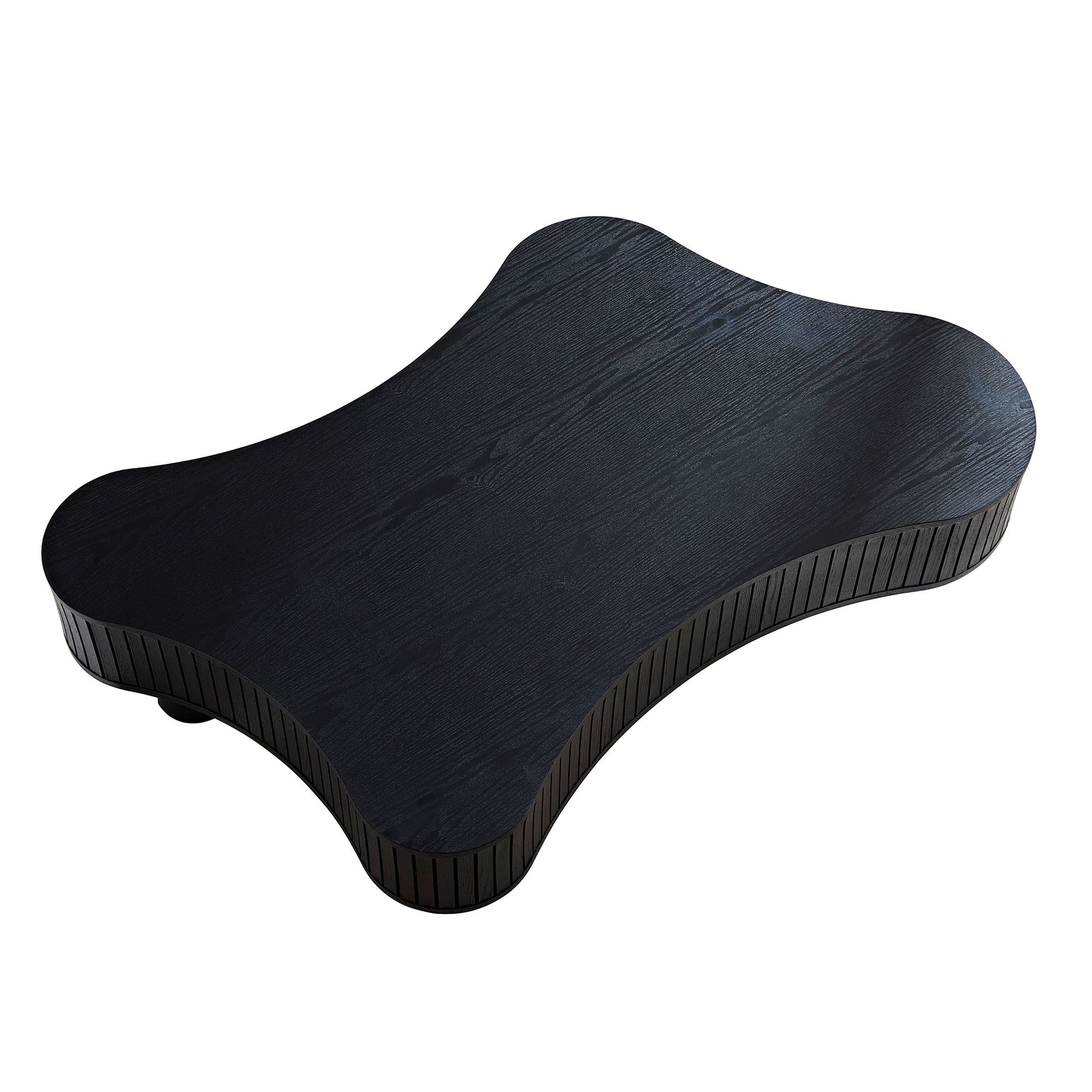 Modern black wood coffee table with unique organic shape and ribbed base