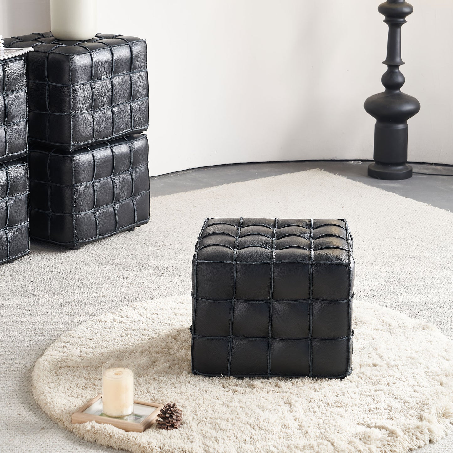 Black quilted leather cube ottoman modern design for living room seating