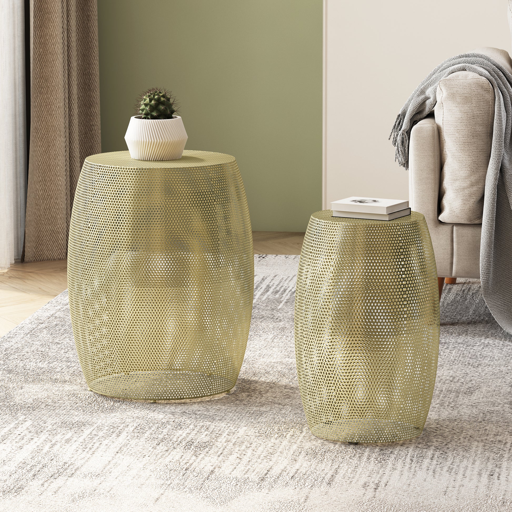 Round gold metal side table with perforated pattern and modern design