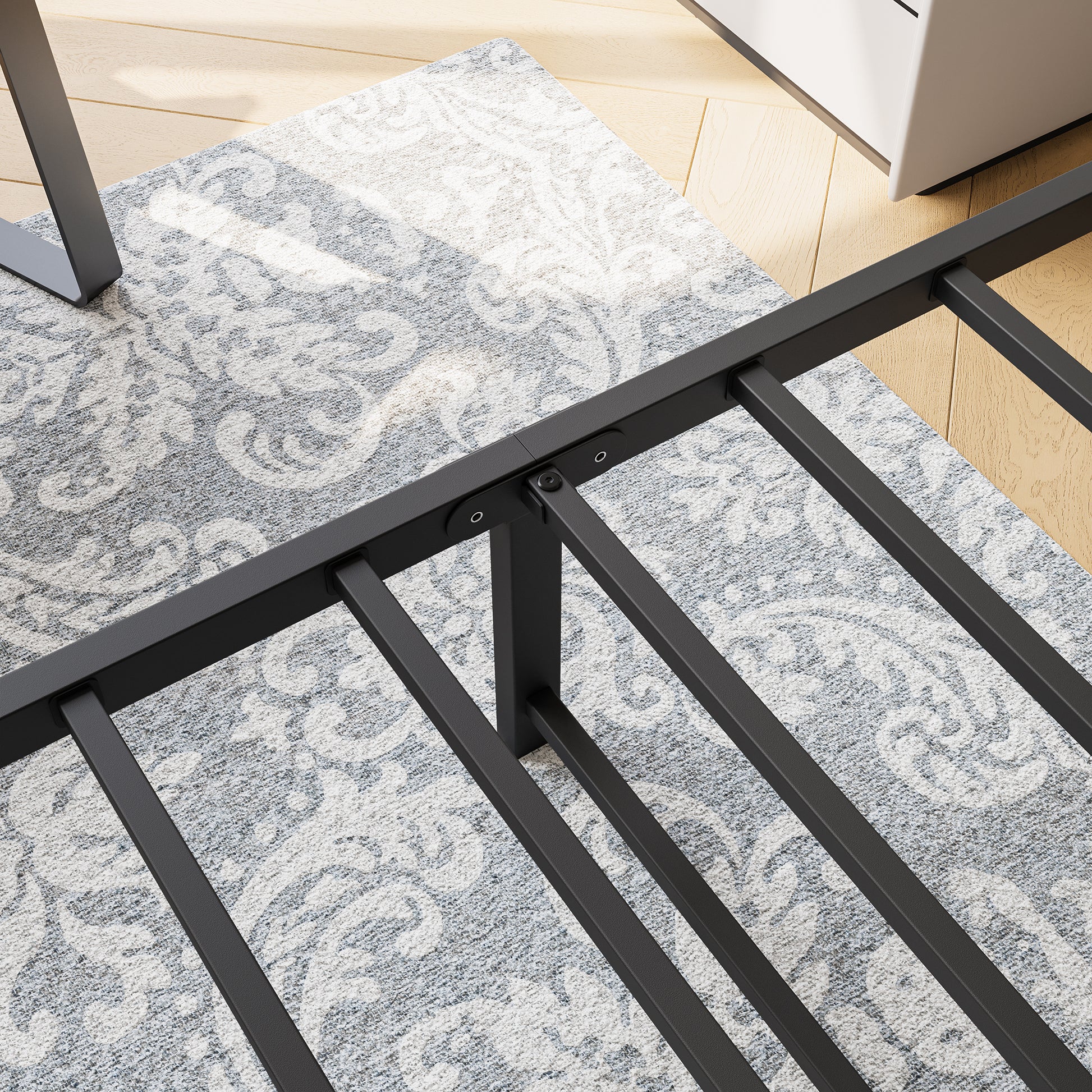 Black metal bed frame with sturdy slats