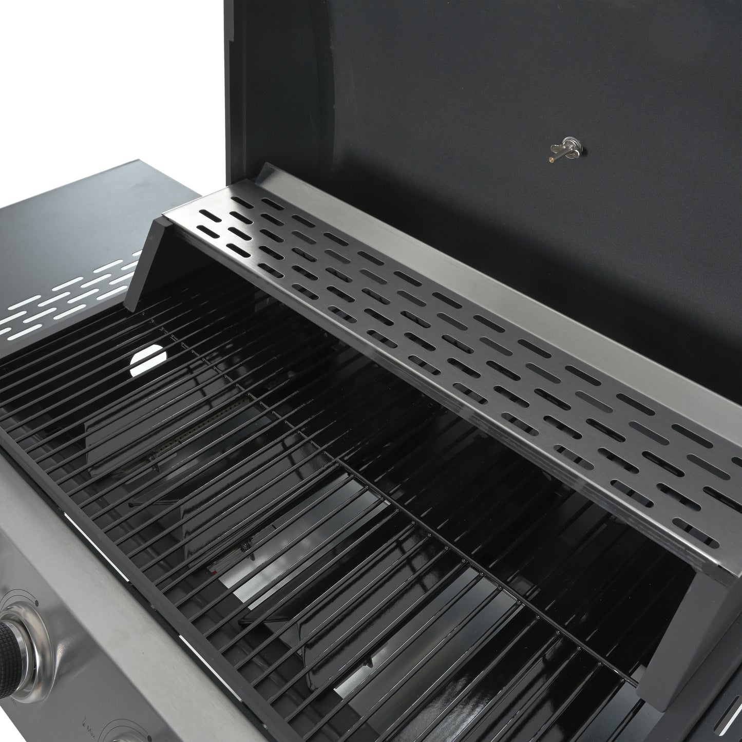 Interior view of a stainless steel gas grill with black grates and a warming rack