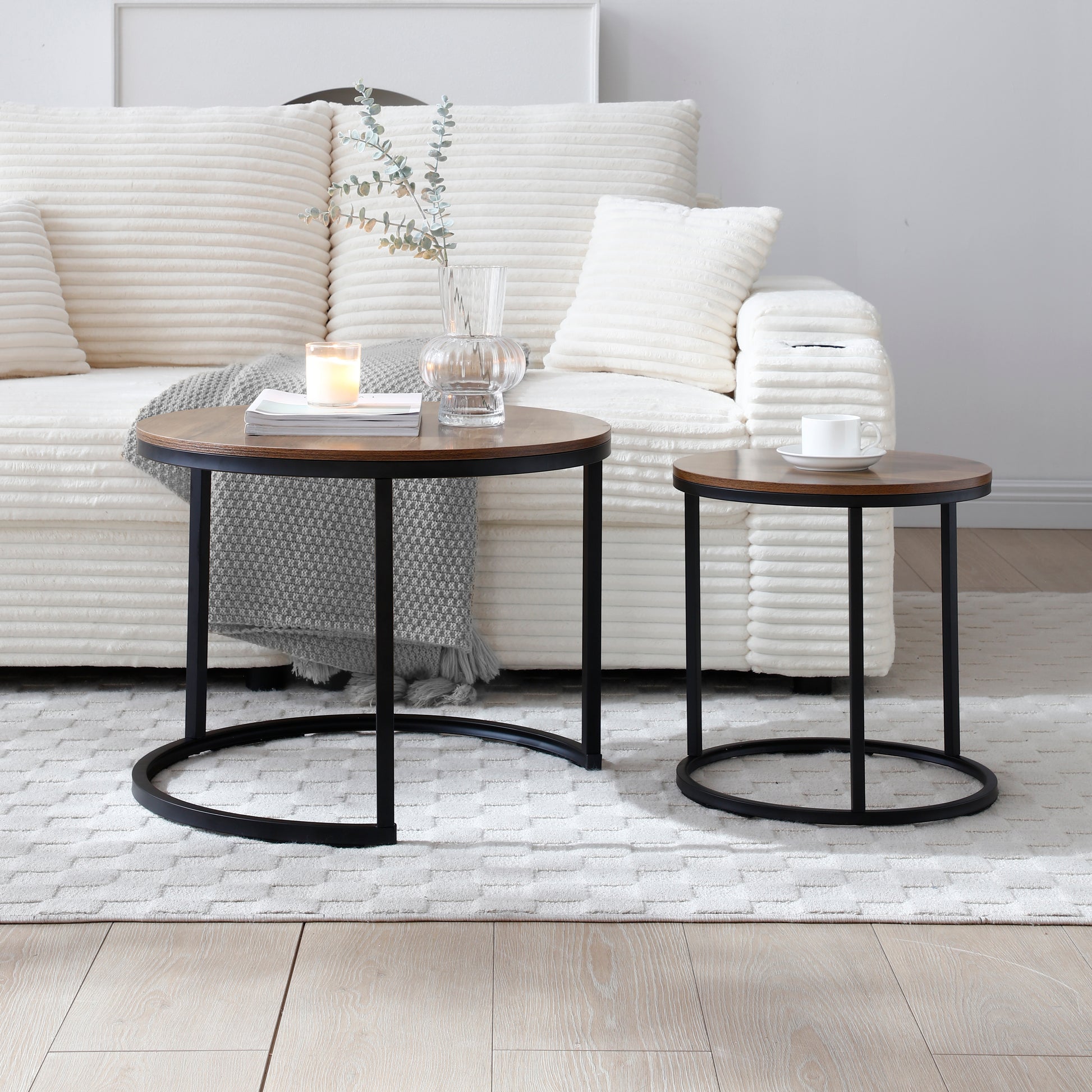 Round oak coffee table with black metal legs perfect for living rooms