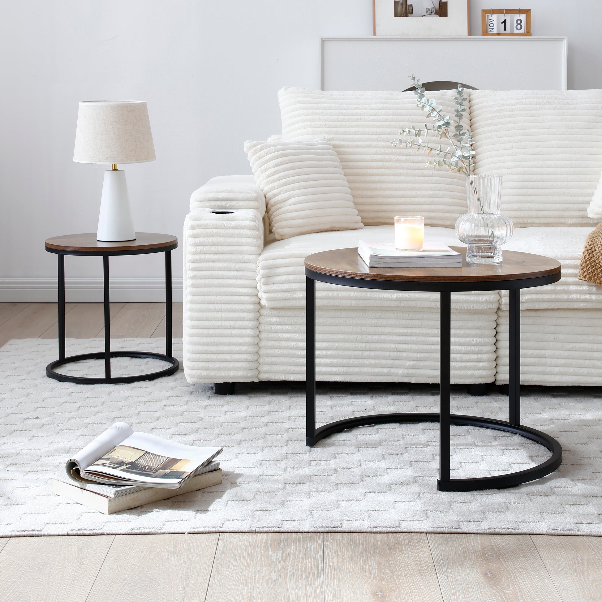 Round wood and metal side table with black legs perfect for living room decor