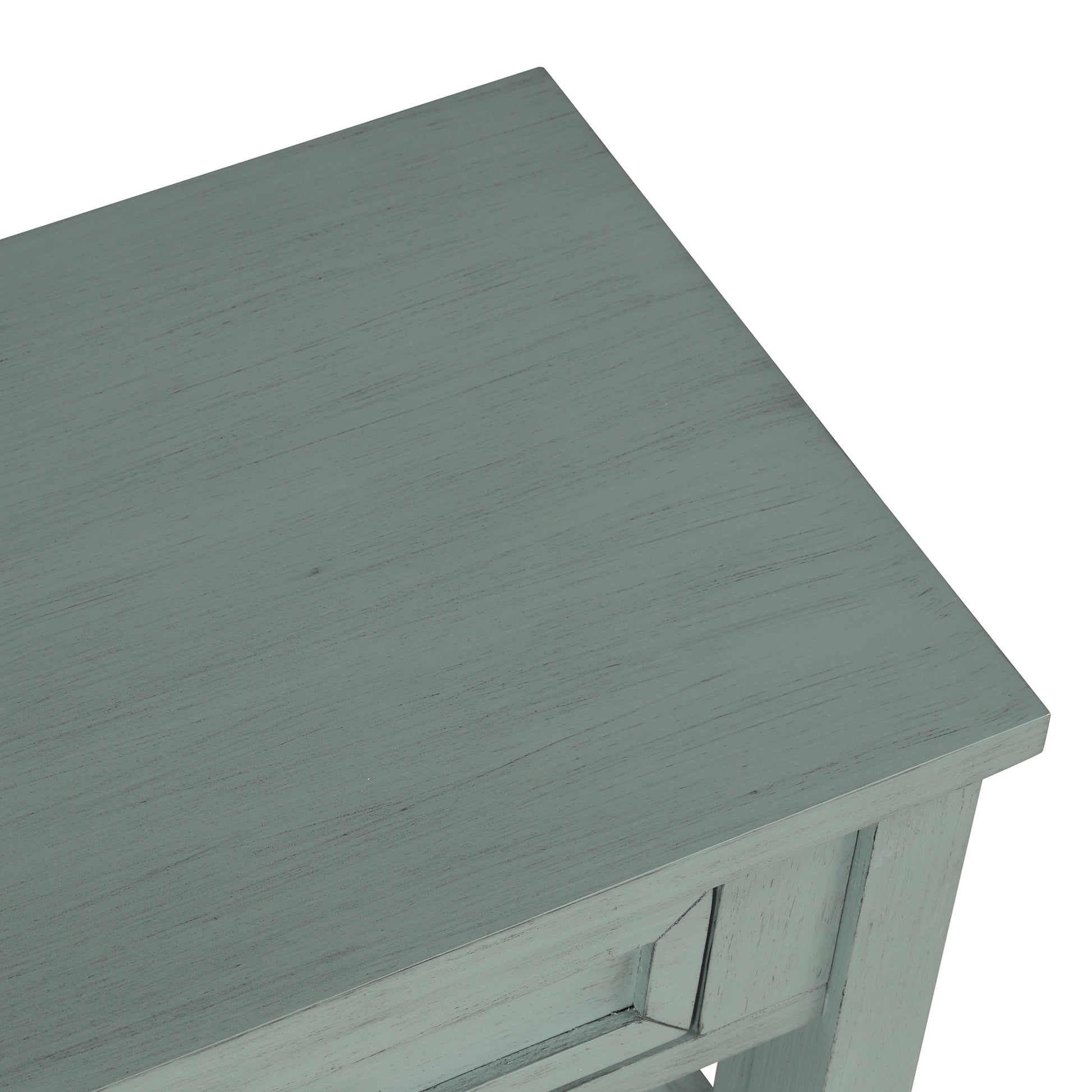 Closeup of a distressed teal console table top with visible wood grain texture