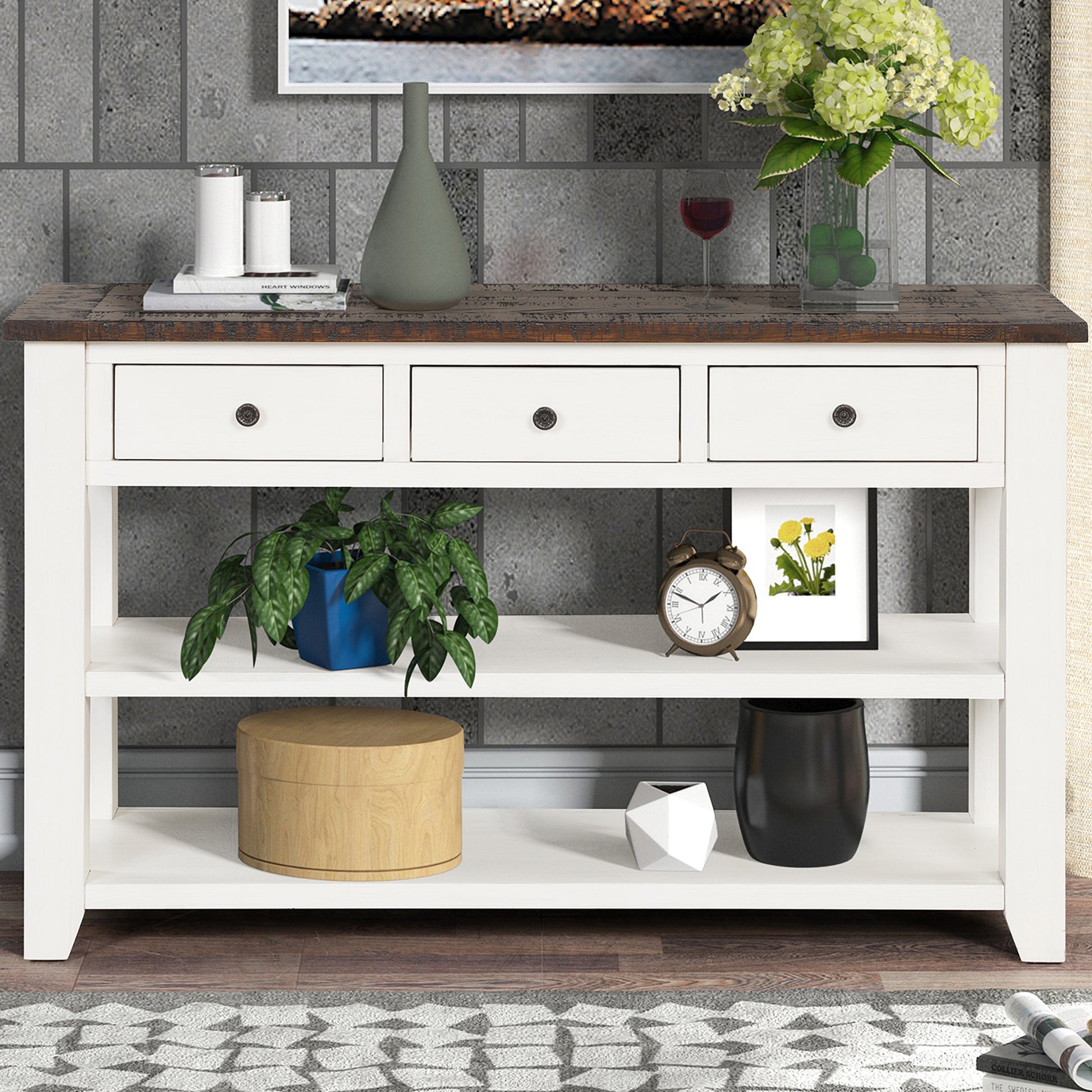 White distressed console table with three drawers and open shelving