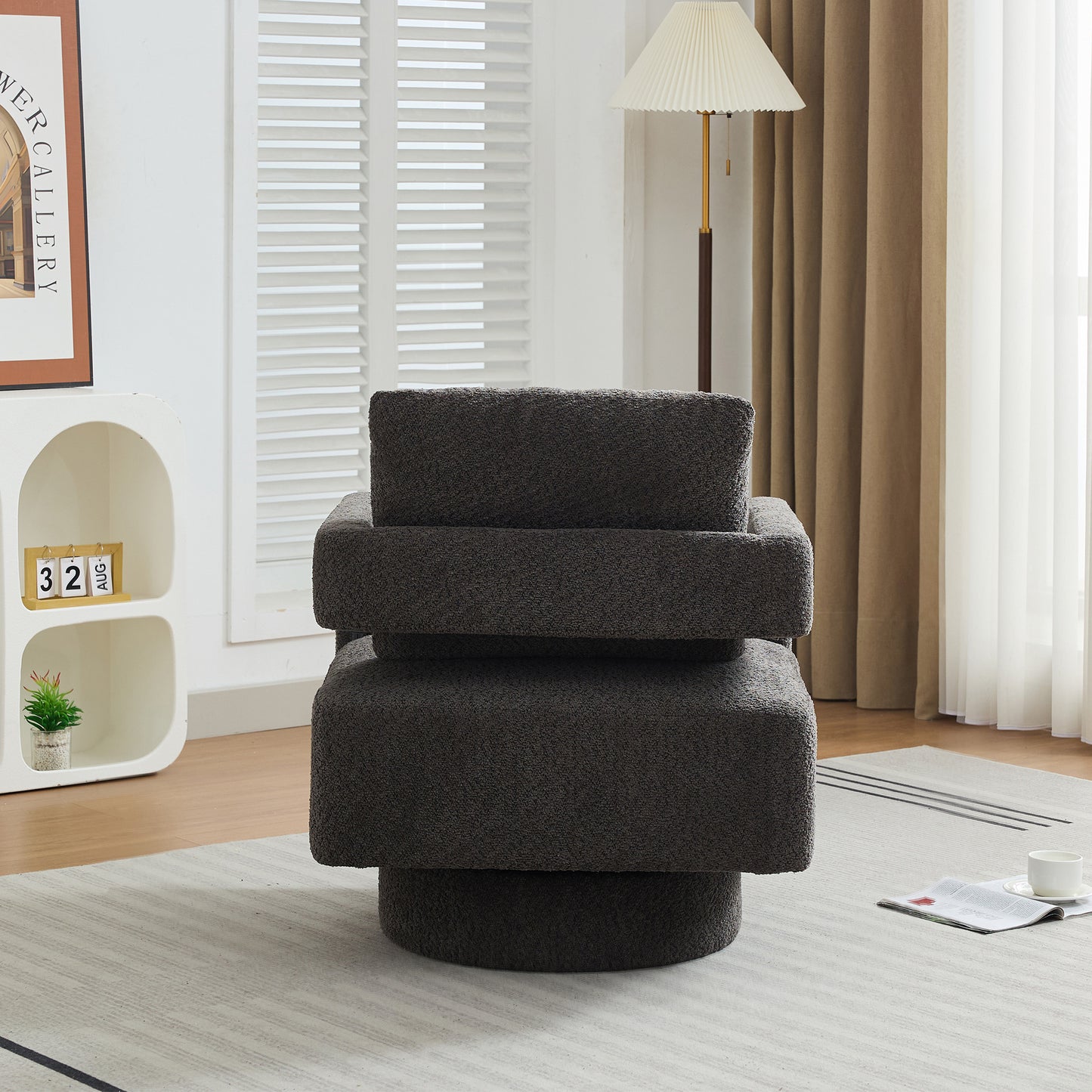 Modern charcoal gray swivel accent chair with plush fabric upholstery