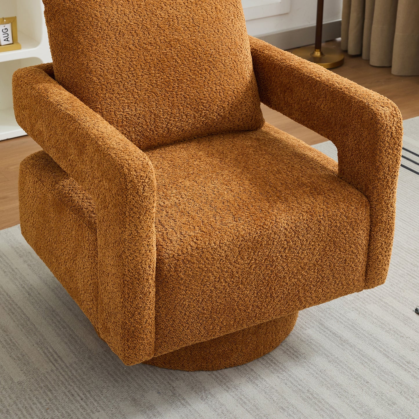 Plush brown boucle armchair with swivel base perfect for cozy living rooms