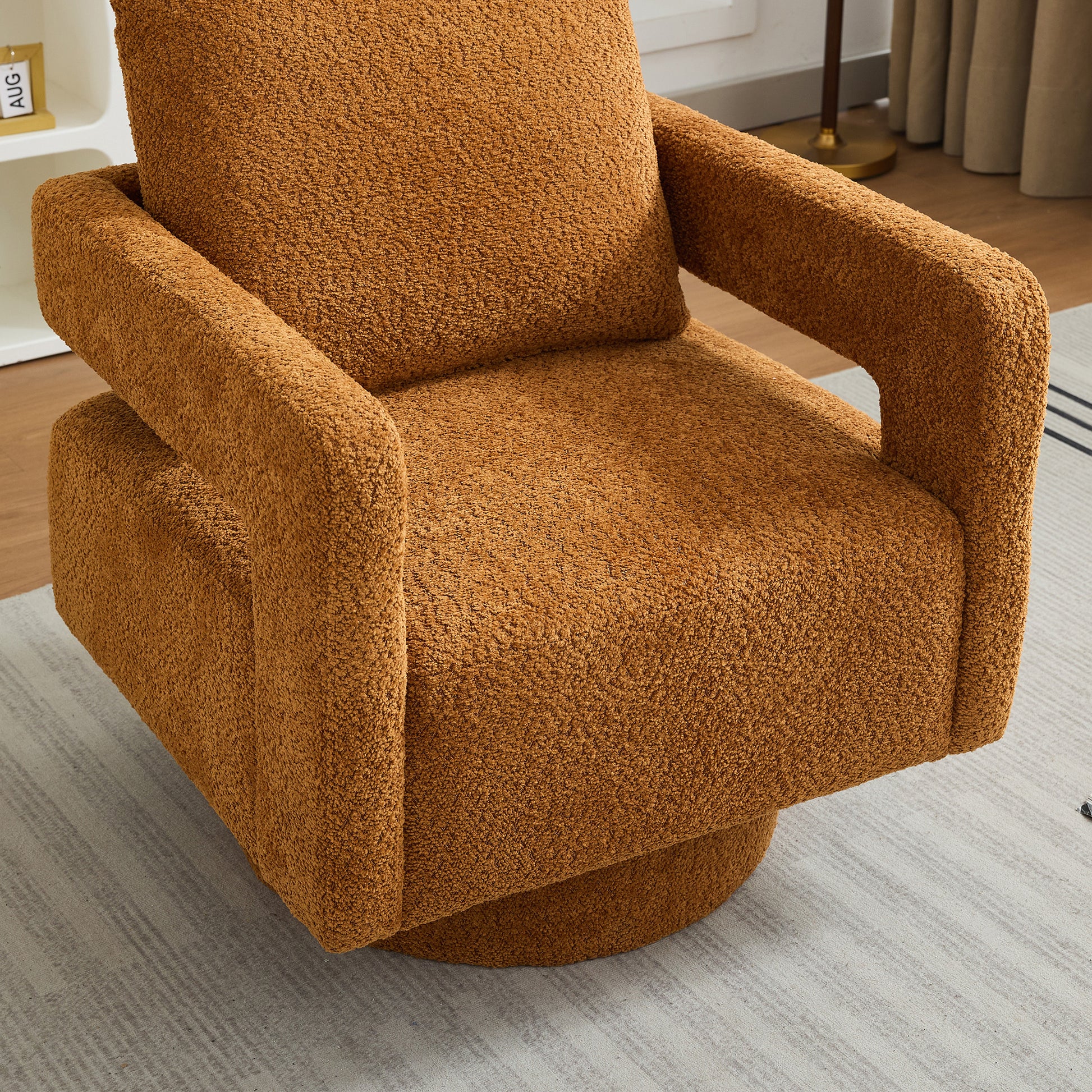 Plush brown boucle armchair with swivel base perfect for cozy living rooms