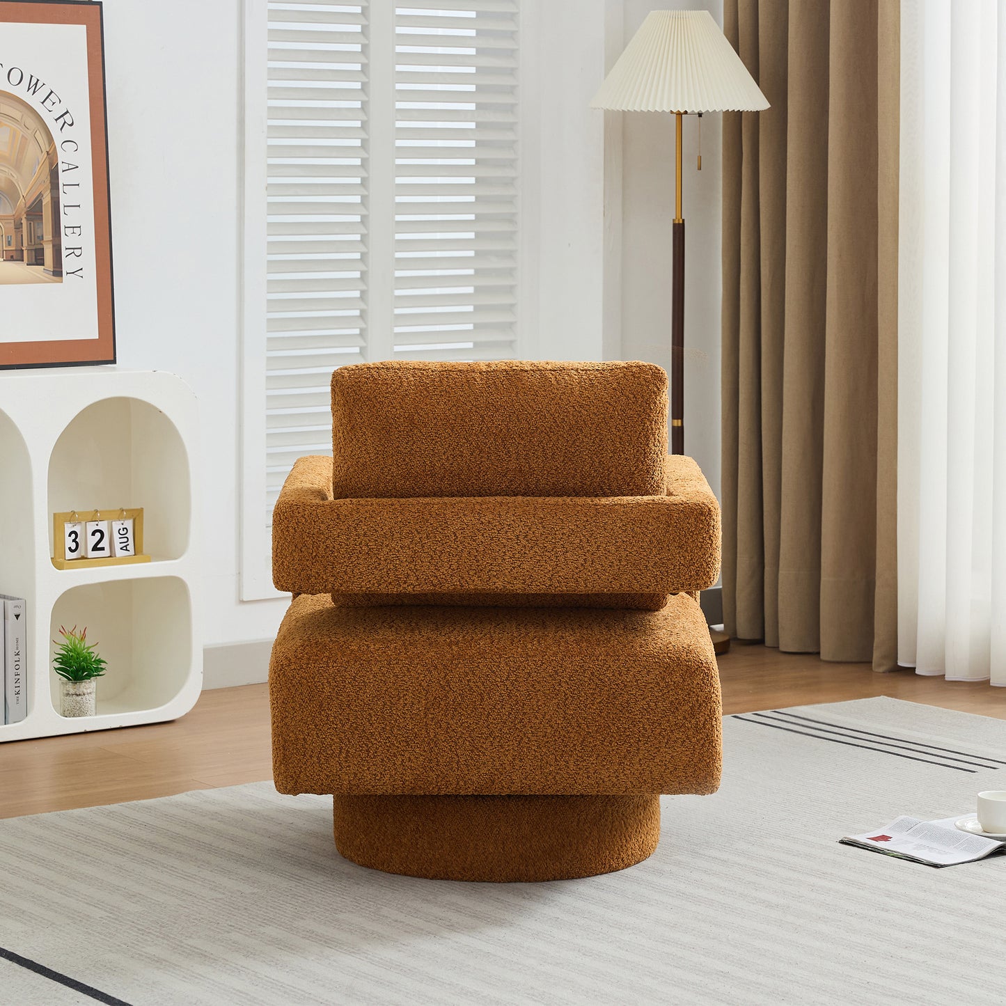 Modern teddy fabric accent chair in rich caramel featuring a sculptural swivel base