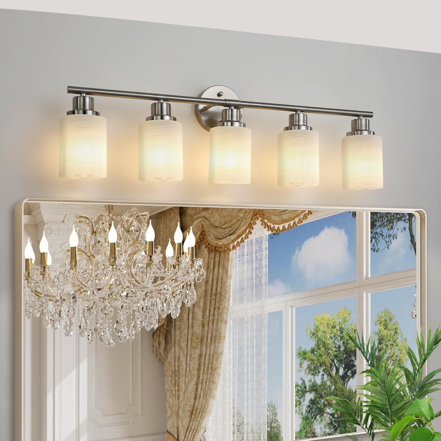 Brushed nickel vanity light with five frosted glass cylinder shades perfect for bathroom illumination