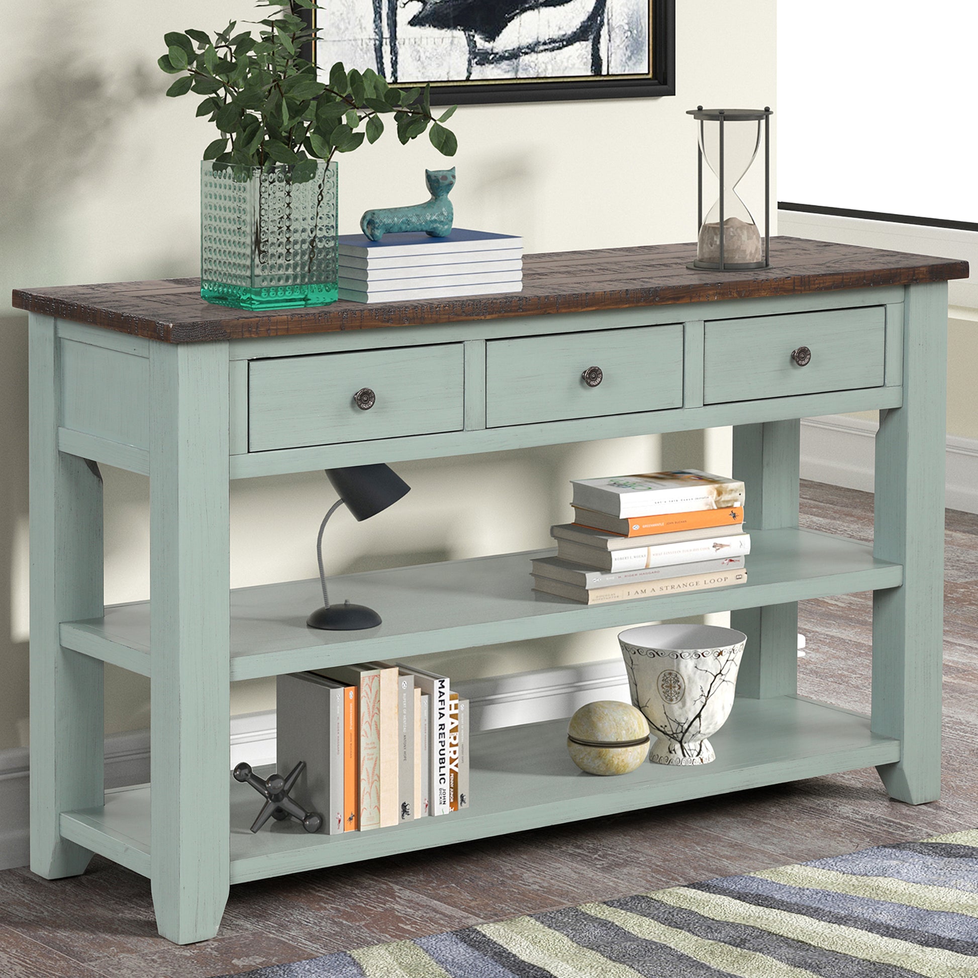 Light blue console table with distressed wood top and three drawers