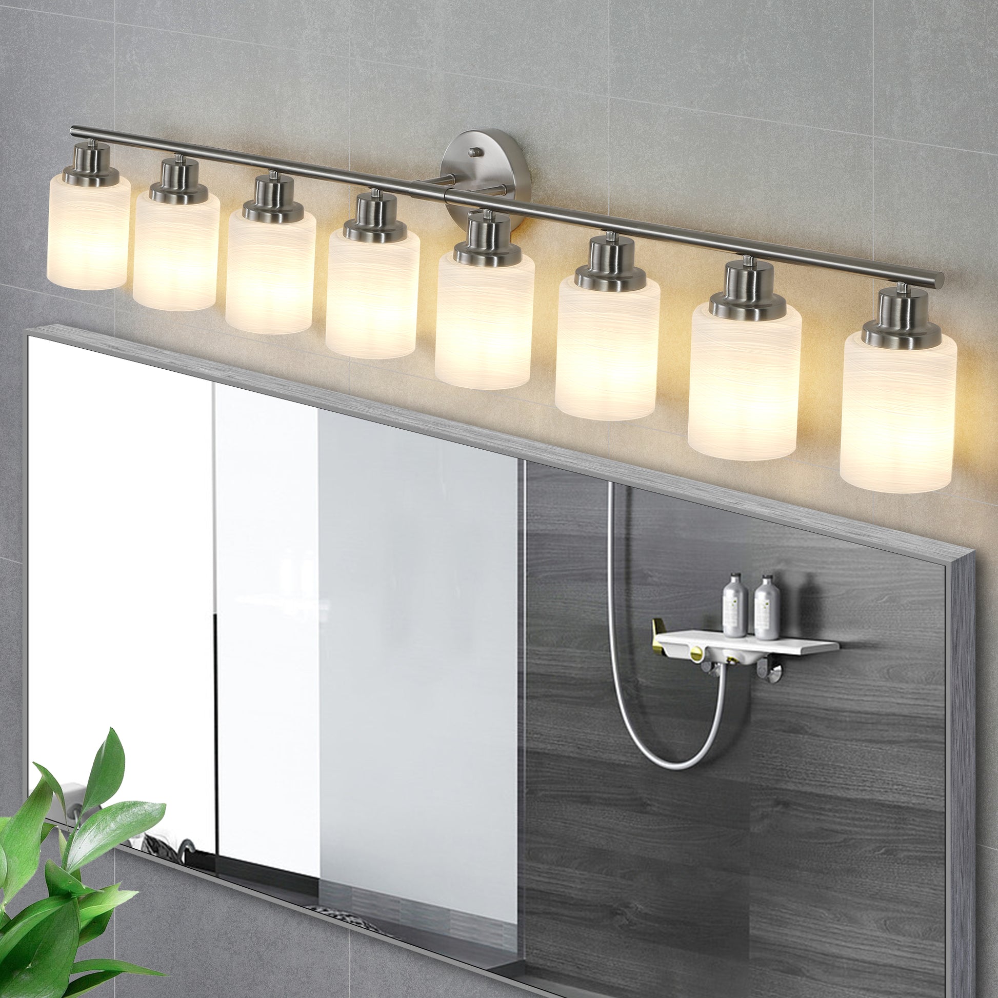 Brushed nickel vanity light bar with eight frosted glass shades for bathroom lighting