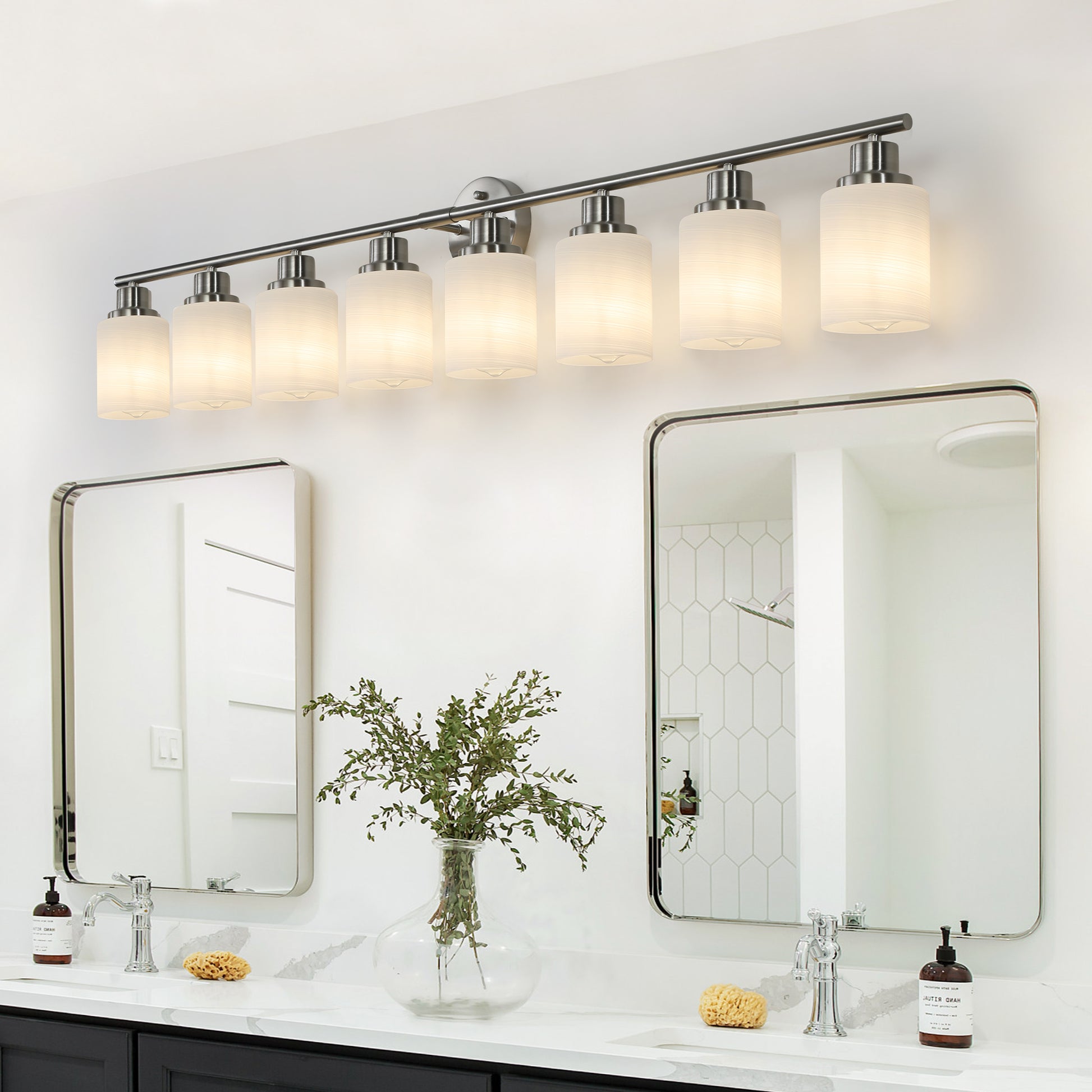 Brushed nickel bathroom vanity light fixture with five ribbed frosted glass shades