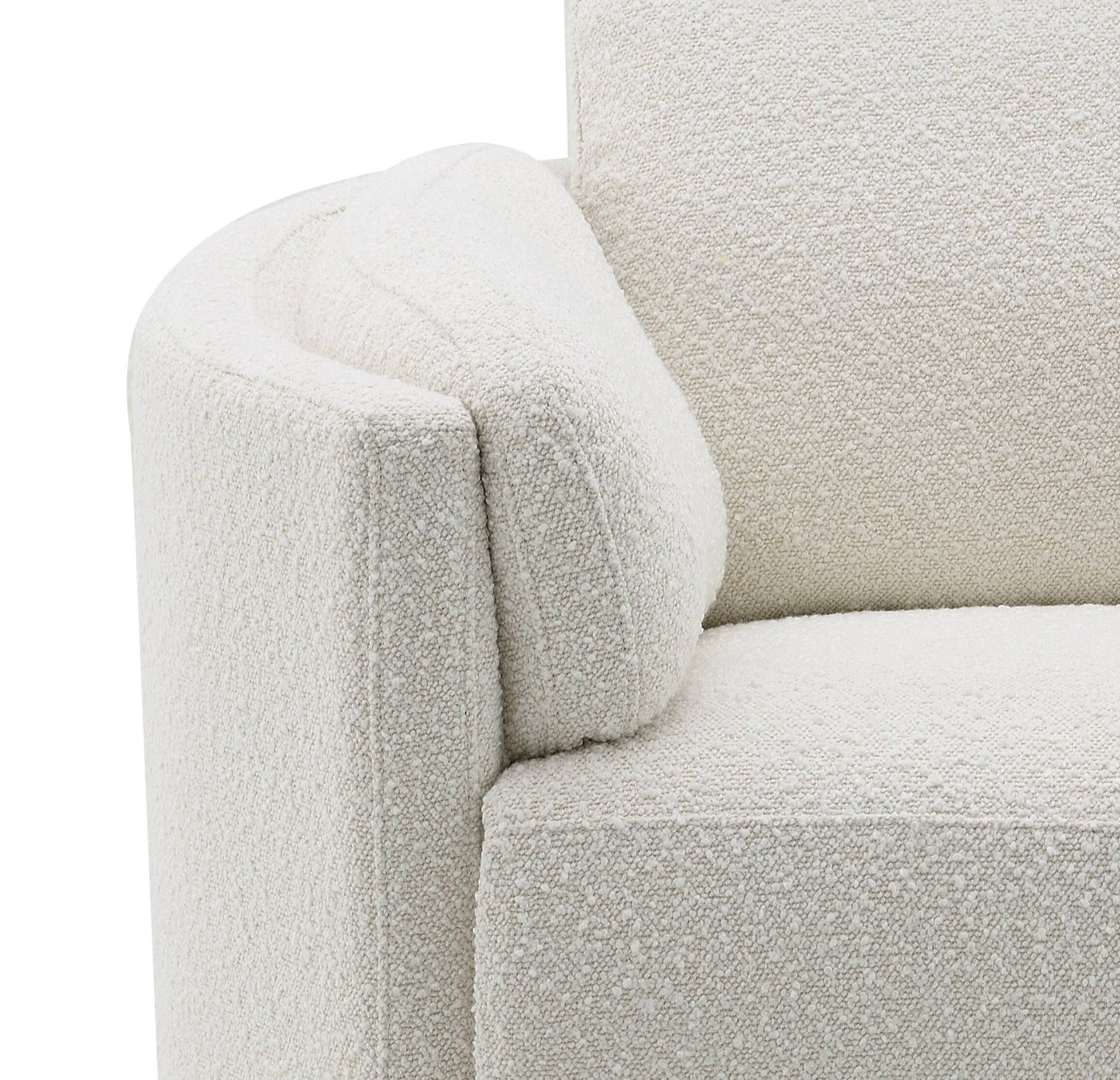 Closeup of a textured cream boucle sofa armrest highlighting the fabrics tactile quality for comfort