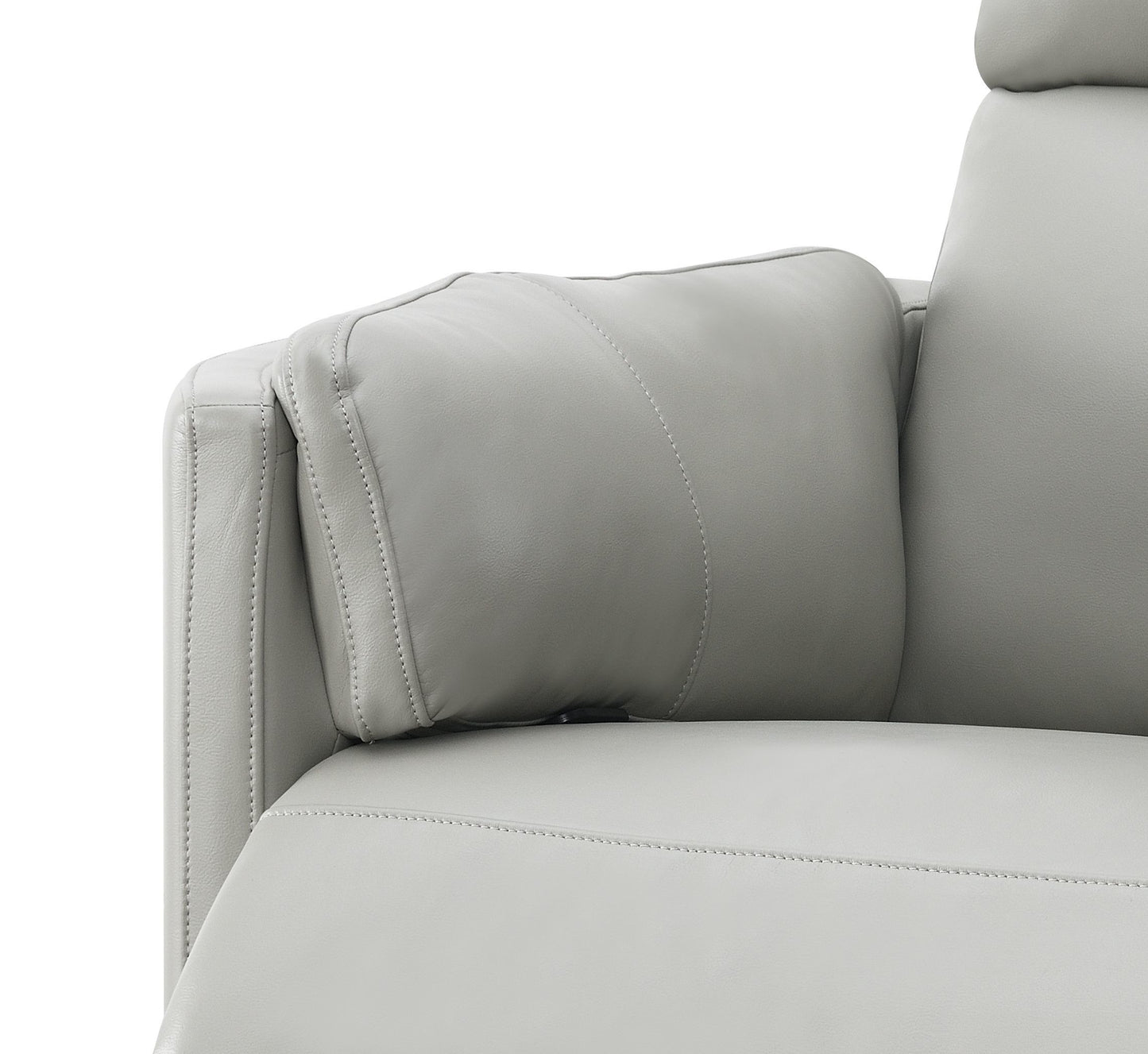 Closeup of a soft grey leather recliner armrest with detailed stitching